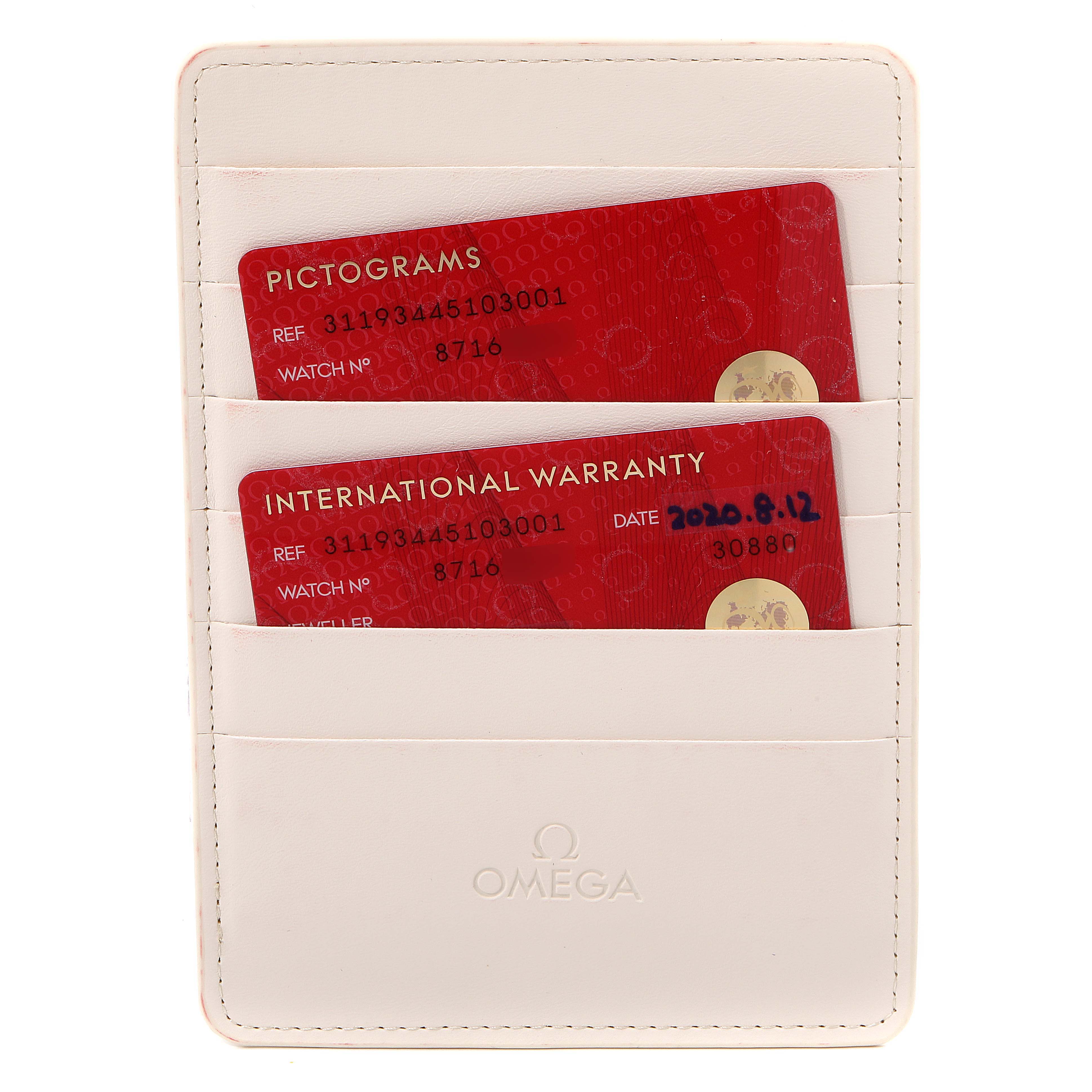 The image shows the warranty cards and authentication documents for an Omega Speedmaster 311.93.44.51.03.001 Men's Stainless Steel Blue Dial 311.93.44.51.03.001 Men's Stainless Steel Blue Dial, placed inside a white Omega-branded holder.