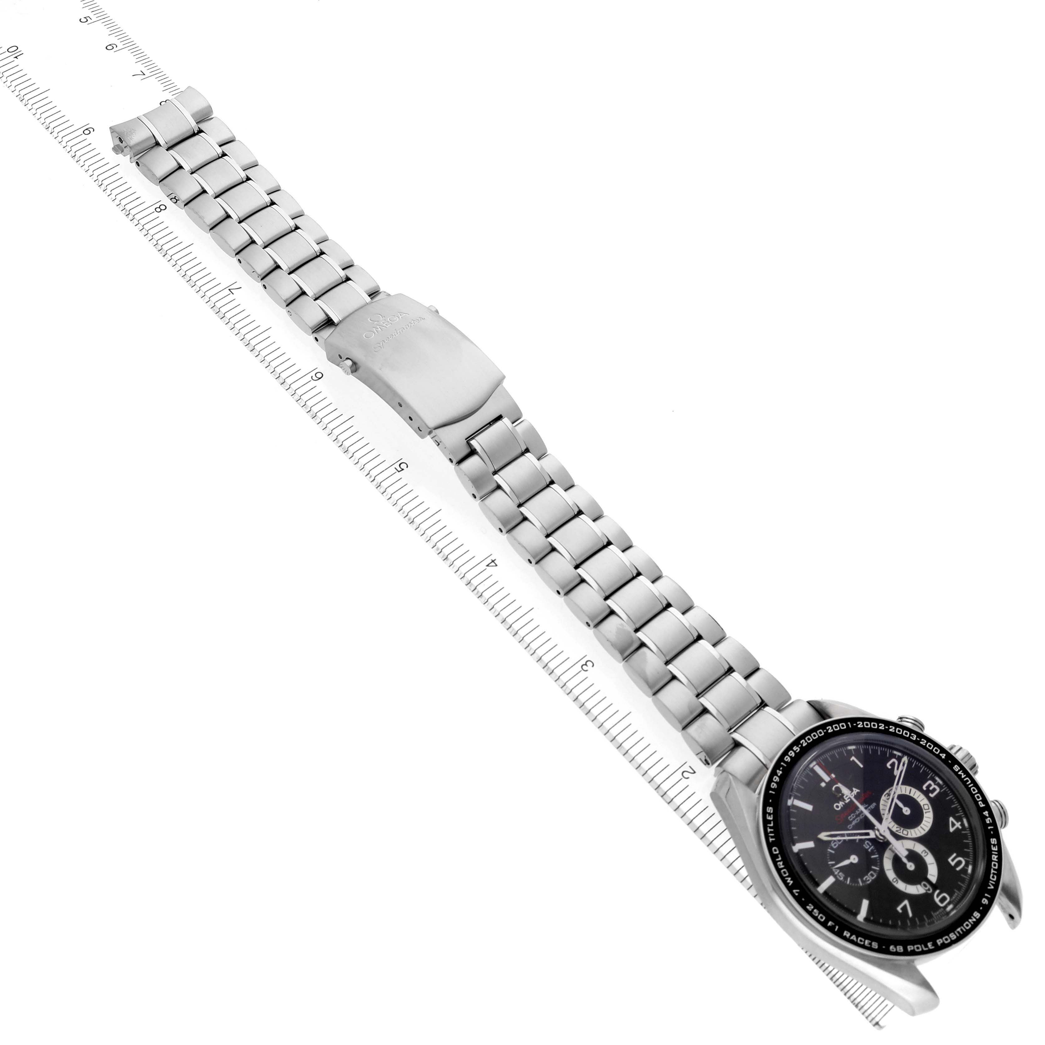 The image shows an Omega Speedmaster 321.30.44.50.01.001 Men
s Stainless Steel Black Dial 321.30.44.50.01.001 Men
s Stainless Steel Black Dial watch from a top-down angle, displaying the bracelet, clasp, and watch face.