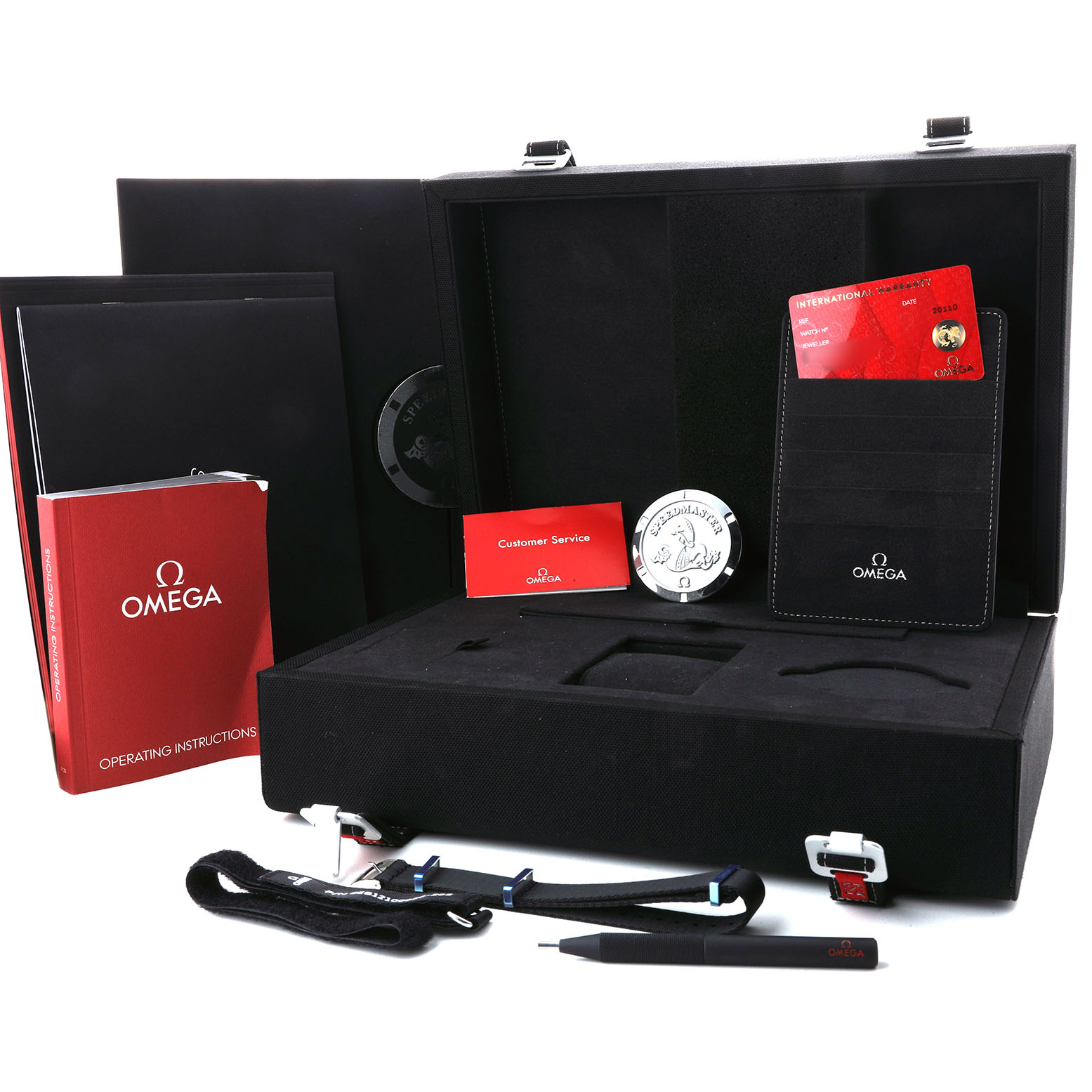The Omega Speedmaster 310.30.42.50.01.002 Men's Stainless Steel Black Dial packaging shows an open case with accessories, documentation, and a strap.