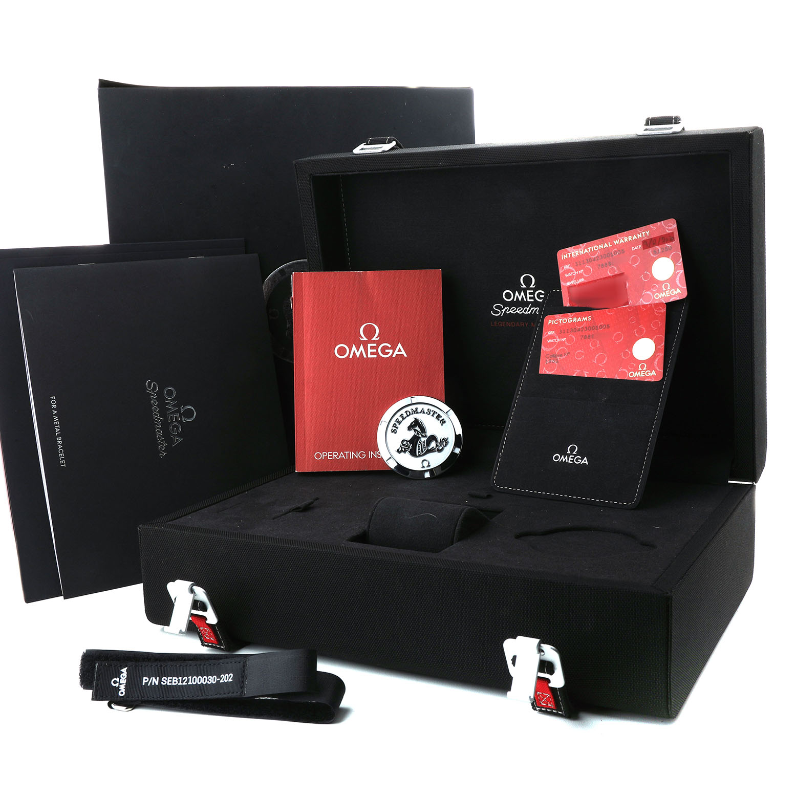 The Omega Speedmaster 311.30.42.30.01.005 Men's Stainless Steel Black Dial set includes the watch box, manuals, warranty cards, strap, and accessories, shown from a frontal angle.
