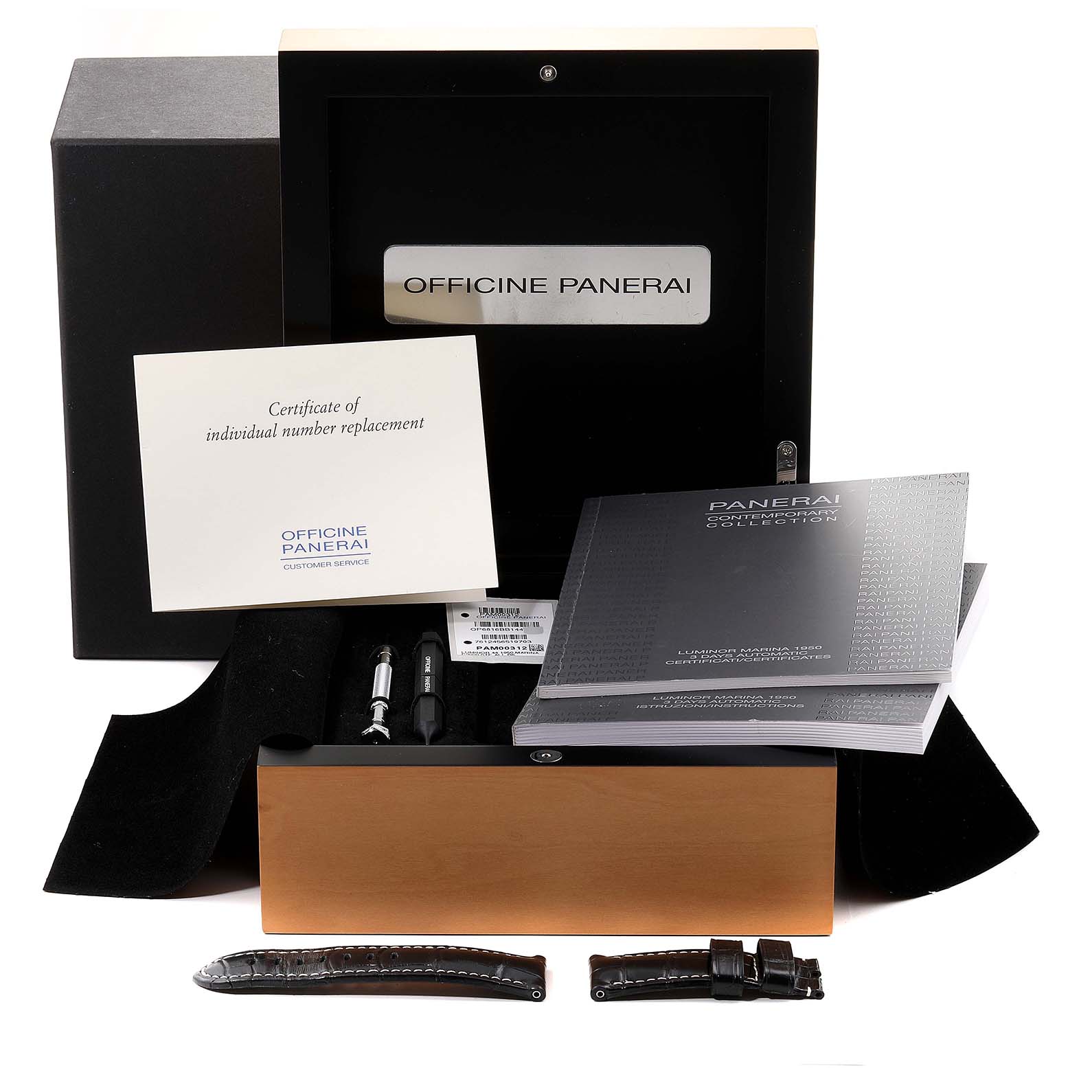 This image shows the accessories of a Panerai Luminor PAM00312 Men's Stainless Steel Black Dial PAM00312 Men's Stainless Steel Black Dial watch, including the box, documentation, tools, and straps.
