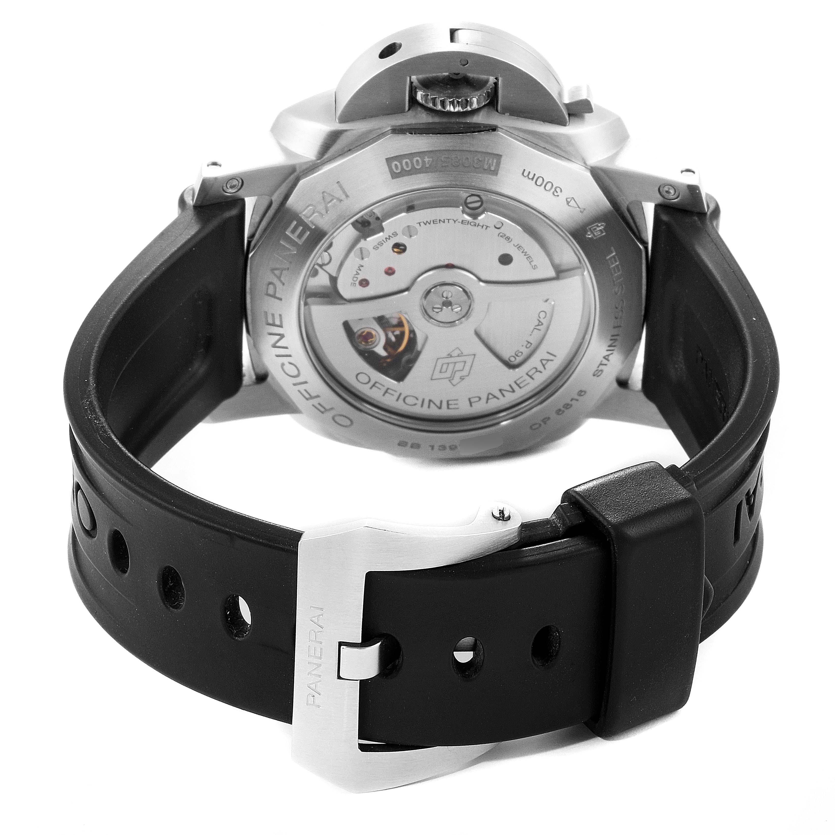 The image shows the back of a Panerai Luminor PAM00312 Men's Stainless Steel Black Dial PAM00312 Men's Stainless Steel Black Dial watch, highlighting its movement and black rubber strap with the buckle.