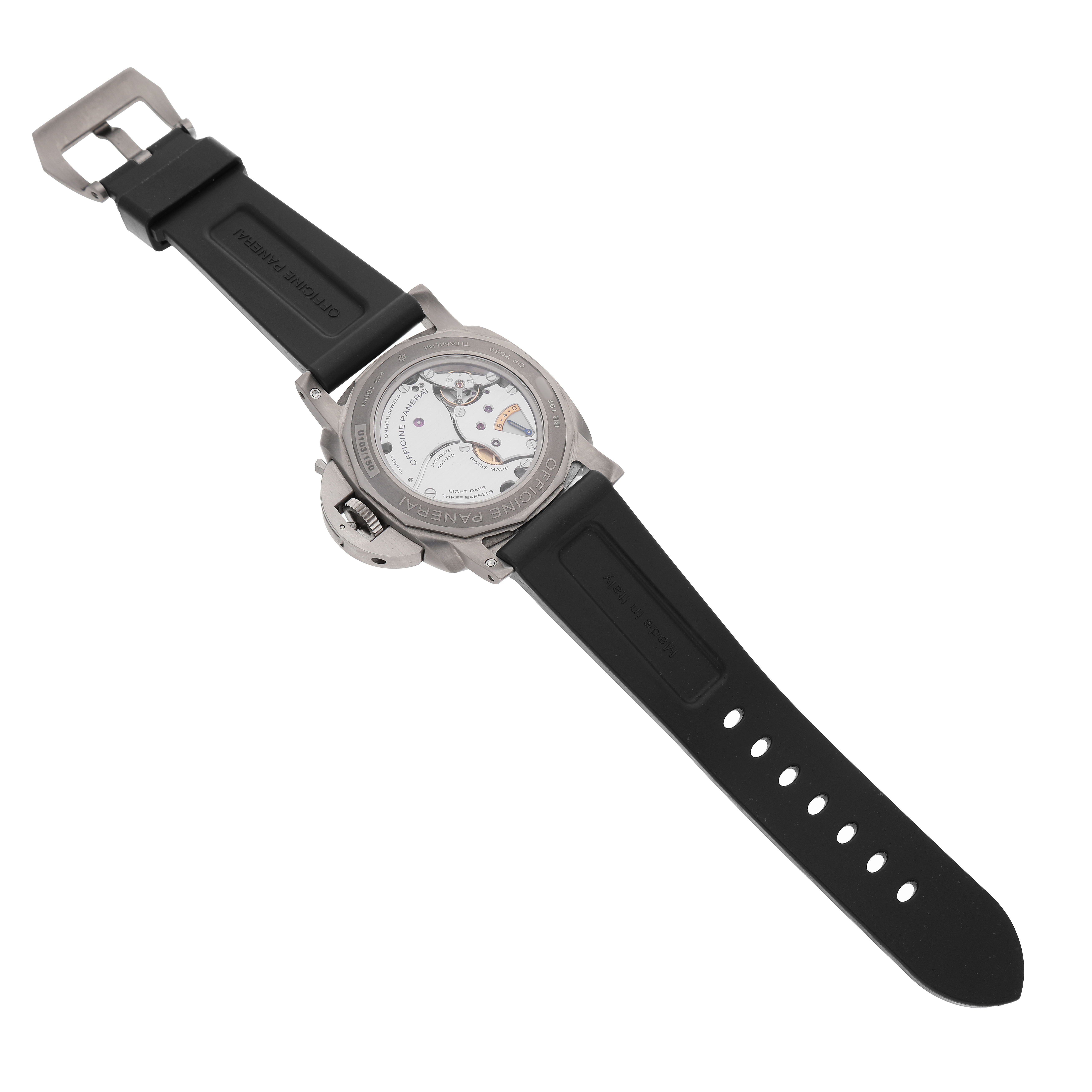 The image shows the back view of a Panerai Luminor PAM00670 Men's Titanium Blue Dial watch, highlighting its transparent case back and black rubber strap.