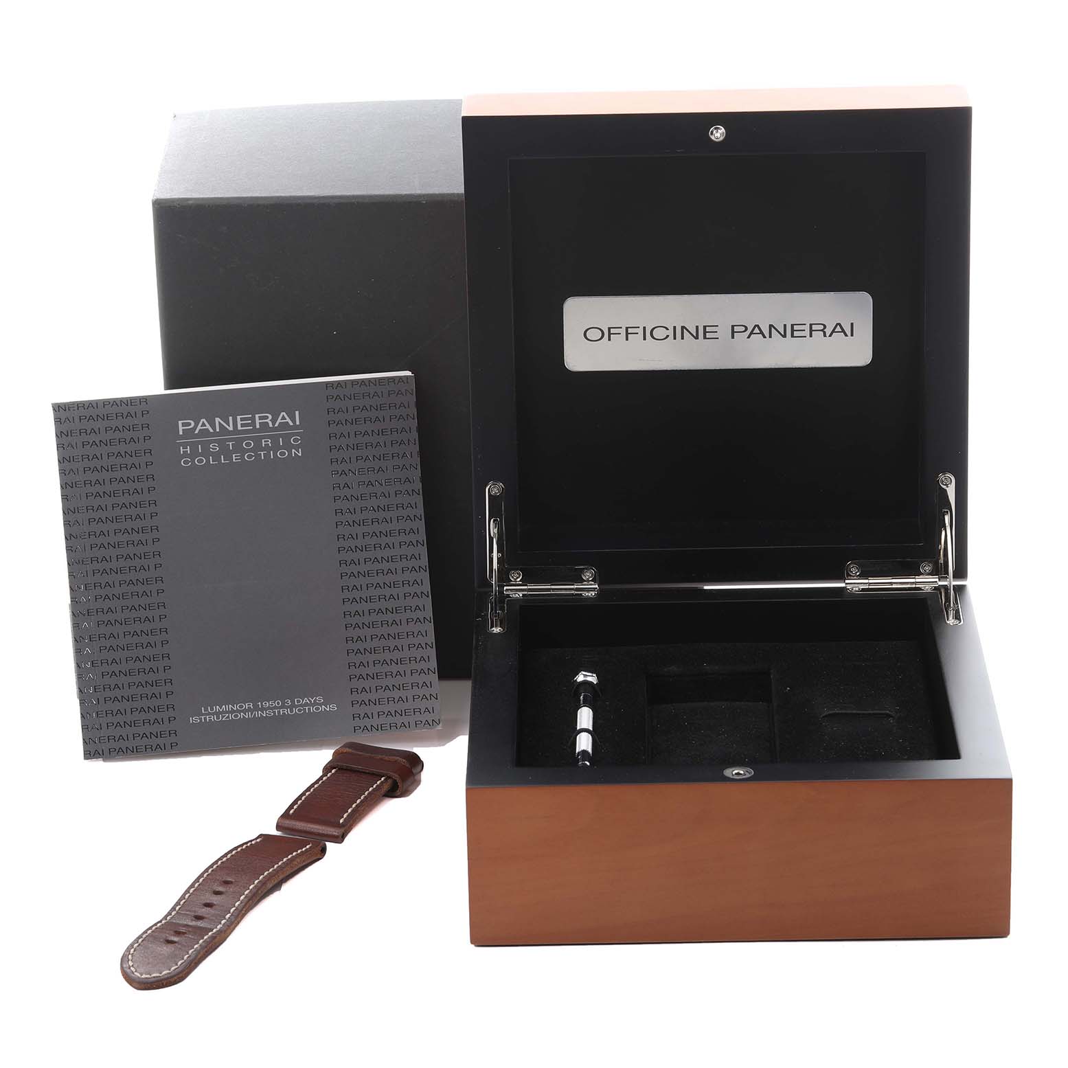 The image shows a Panerai Luminor PAM00372 Men
s Stainless Steel Black Dial PAM00372 Men
s Stainless Steel Black Dial watch box, a leather strap, and instruction booklet.