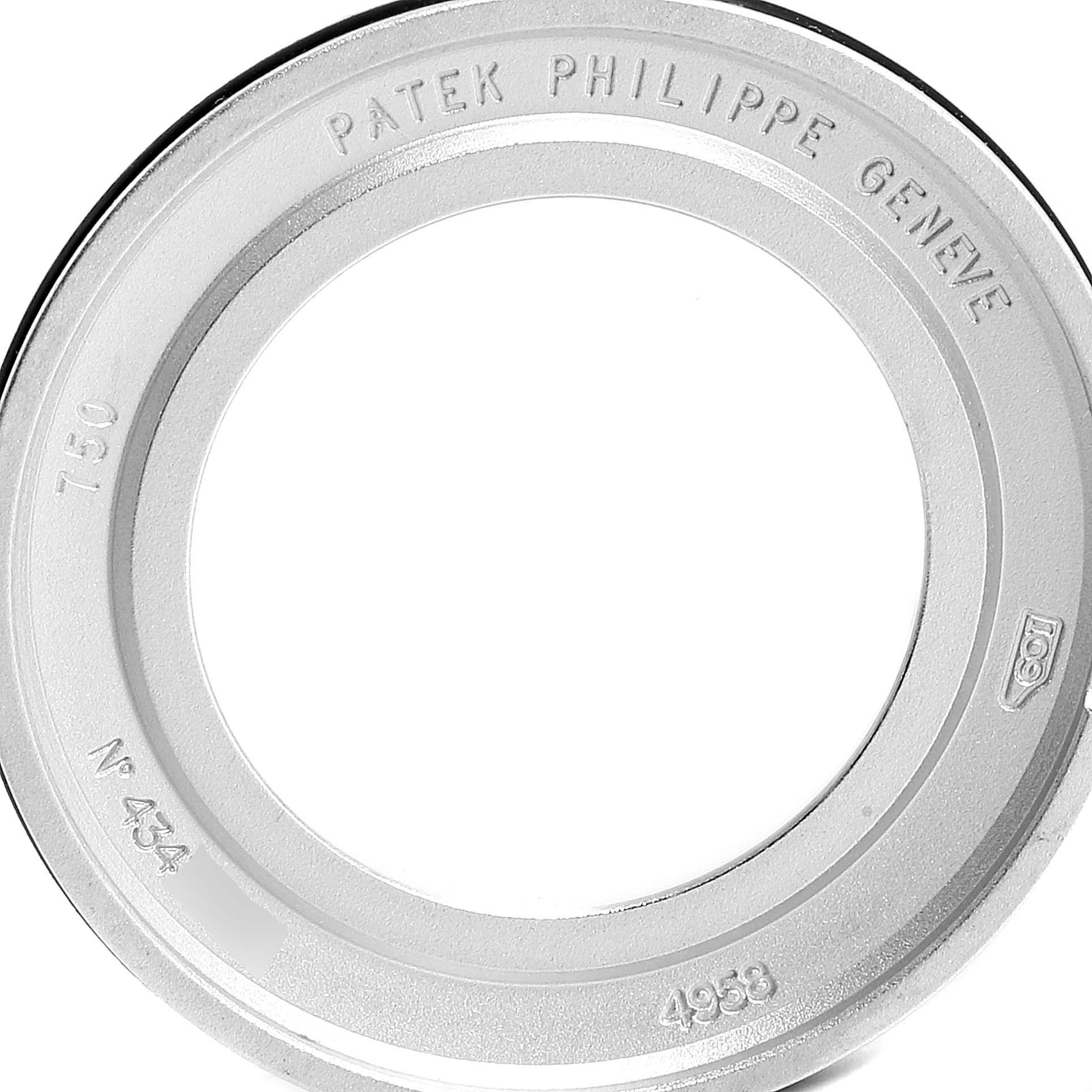 The image shows a close-up of the back casing of a Patek Philippe Calatrava 4958G Women's White Gold Mother of Pearl Dial 4958G Women's White Gold Mother of Pearl Dial model.