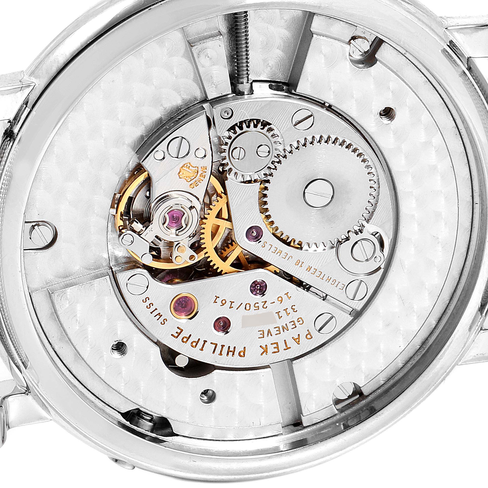 The image shows the intricate internal mechanism of the Calatrava model watch by Patek Philippe from a back view angle.