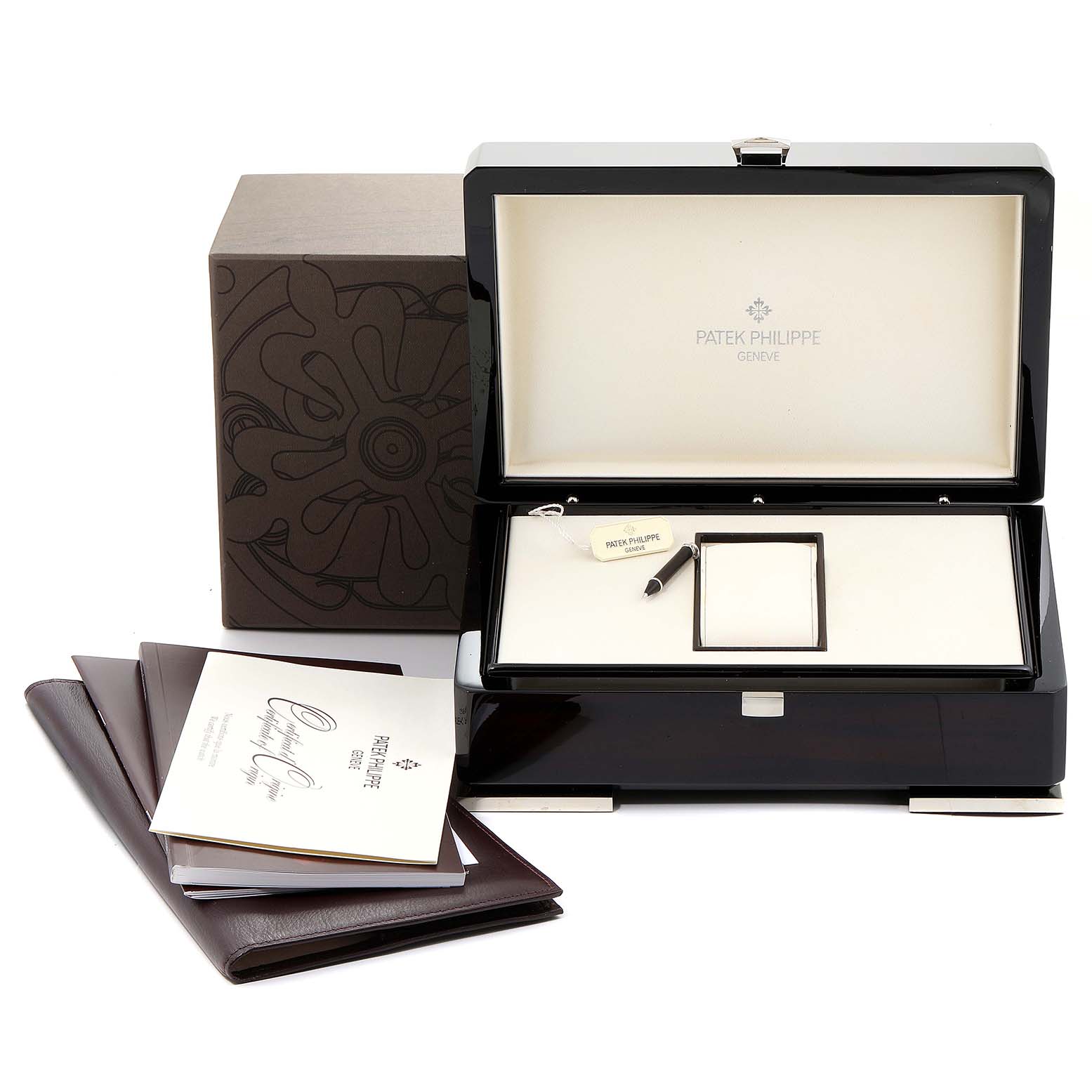 The image shows the box, accessories, and documentation for the Patek Philippe Calatrava 4958G Women's White Gold Mother of Pearl Dial 4958G Women's White Gold Mother of Pearl Dial watch.