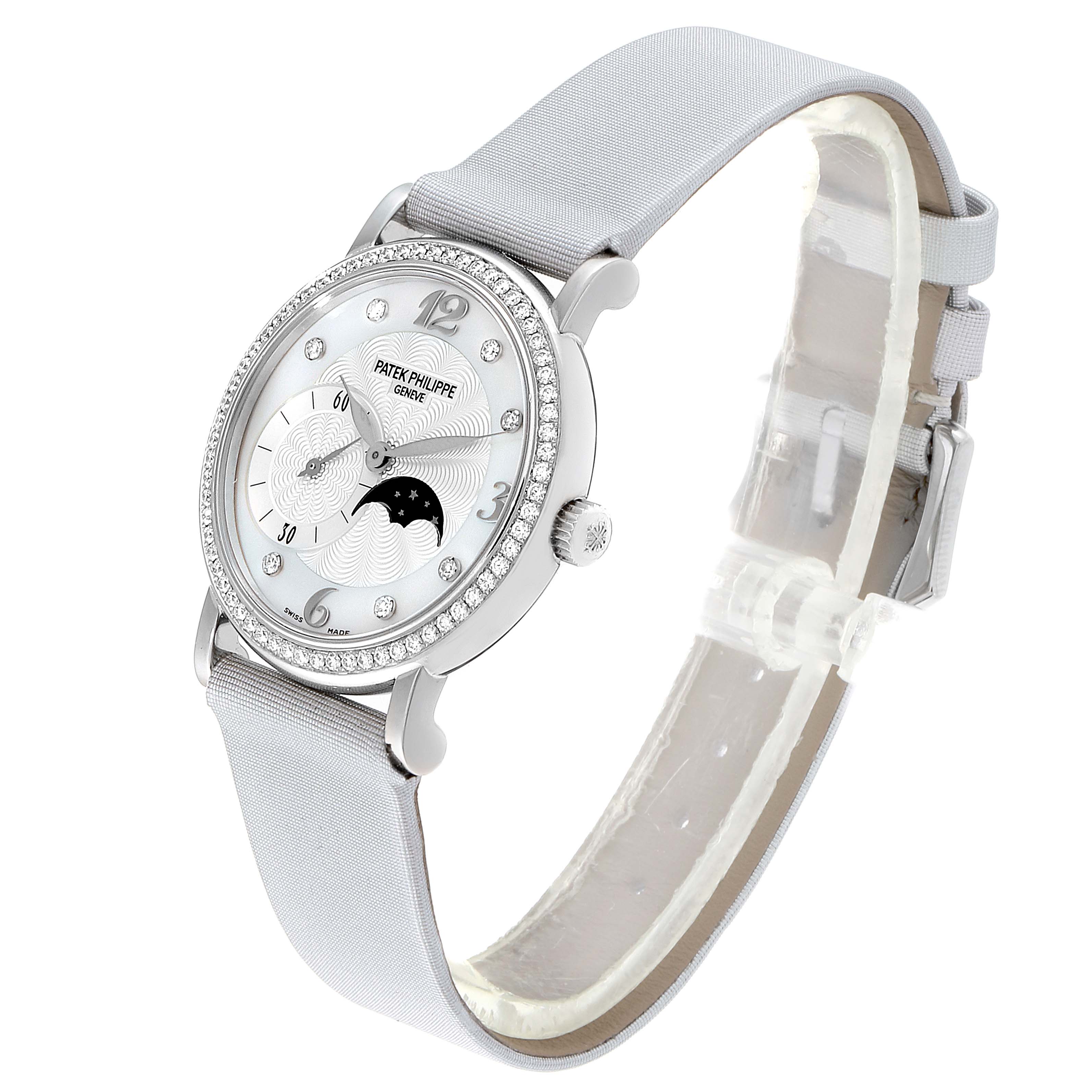 The image shows a Patek Philippe Calatrava 4958G Women's White Gold Mother of Pearl Dial 4958G Women's White Gold Mother of Pearl Dial watch from a front-side angle, showcasing its face, bezel, and strap.