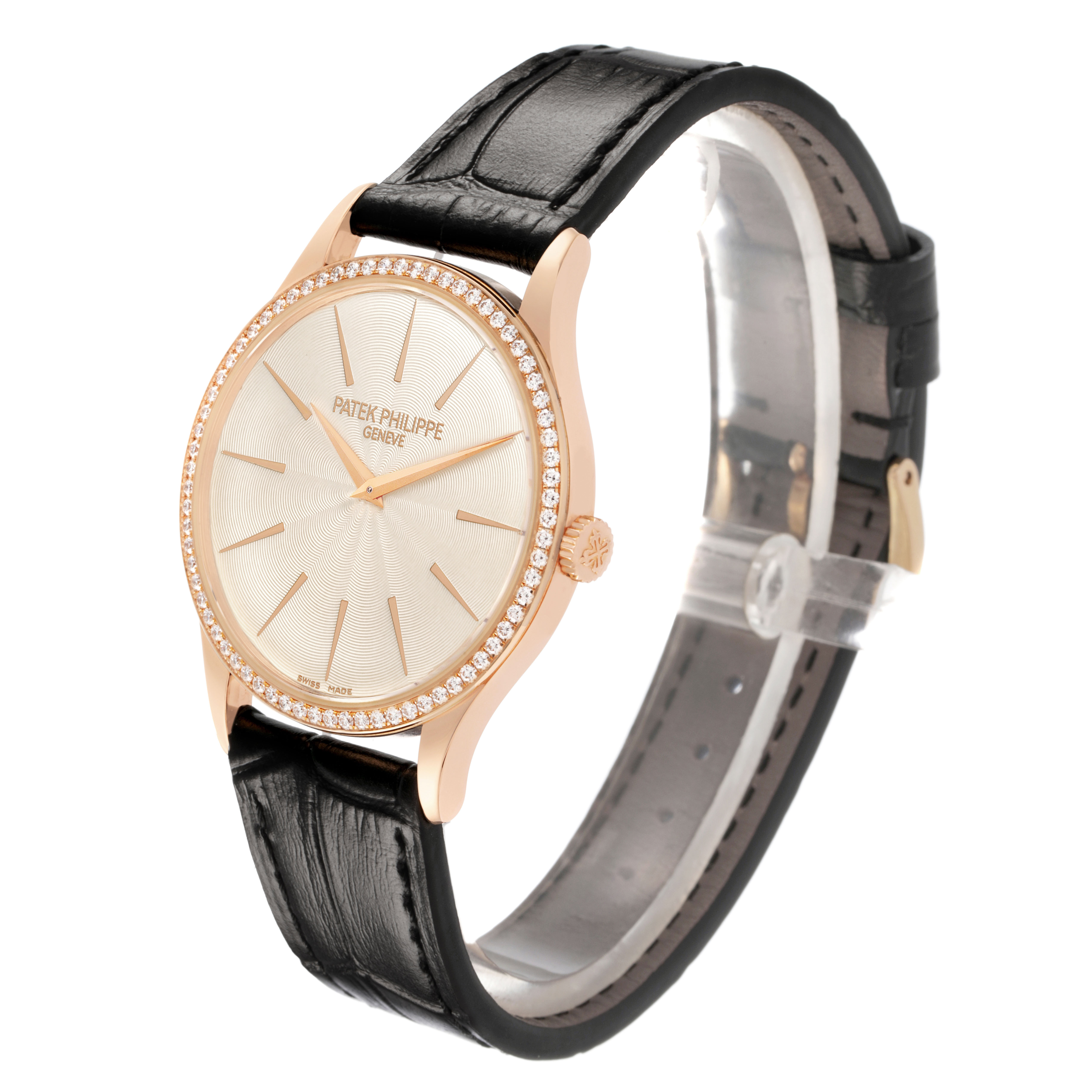 The Patek Philippe Calatrava 4897R-010 Women's Rose Gold Beige Dial watch is shown at a three-quarter angle, highlighting the face, bezel, and strap.