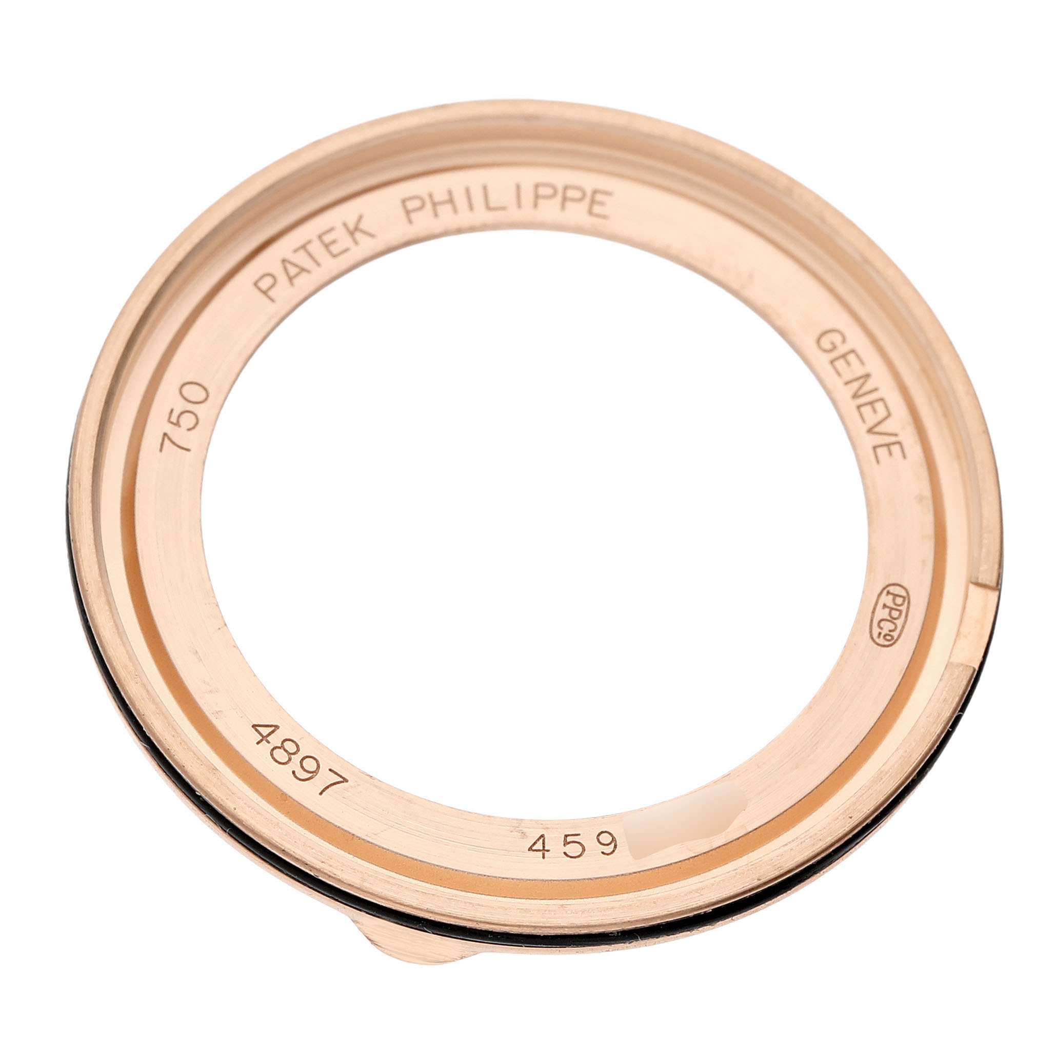 The image shows a close-up of the rose gold bezel back for the Patek Philippe Calatrava 4897R-010 Women's Rose Gold Beige Dial watch, displaying engravings and hallmark.