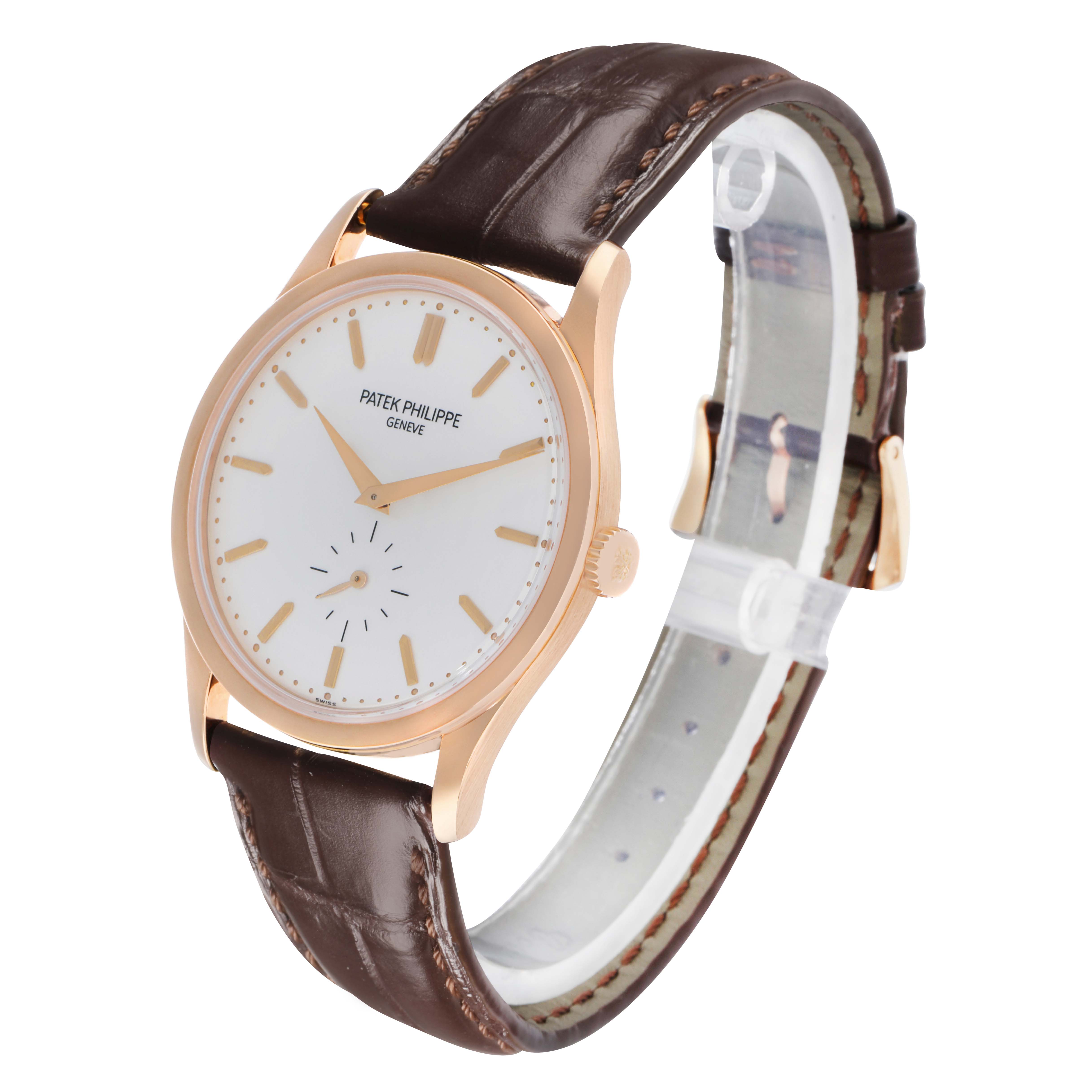 The Patek Philippe Calatrava 5196R Men
s Rose Gold Silver Dial watch is shown at a slight angle, highlighting the dial, case, crown, and brown leather strap.