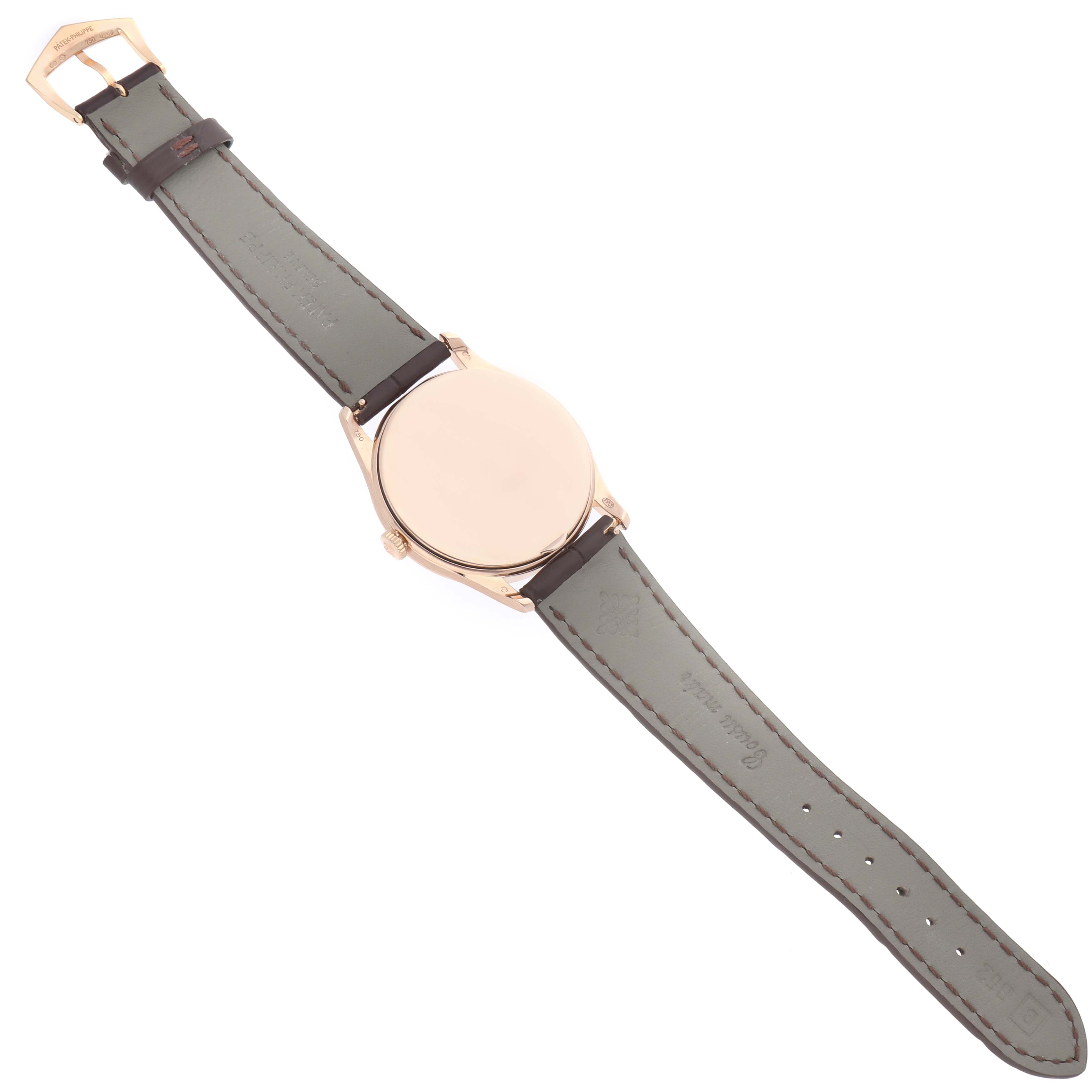 The image shows the backside of a Patek Philippe Calatrava 5196R Men
s Rose Gold Silver Dial watch, displaying the case, strap, and buckle in full view.