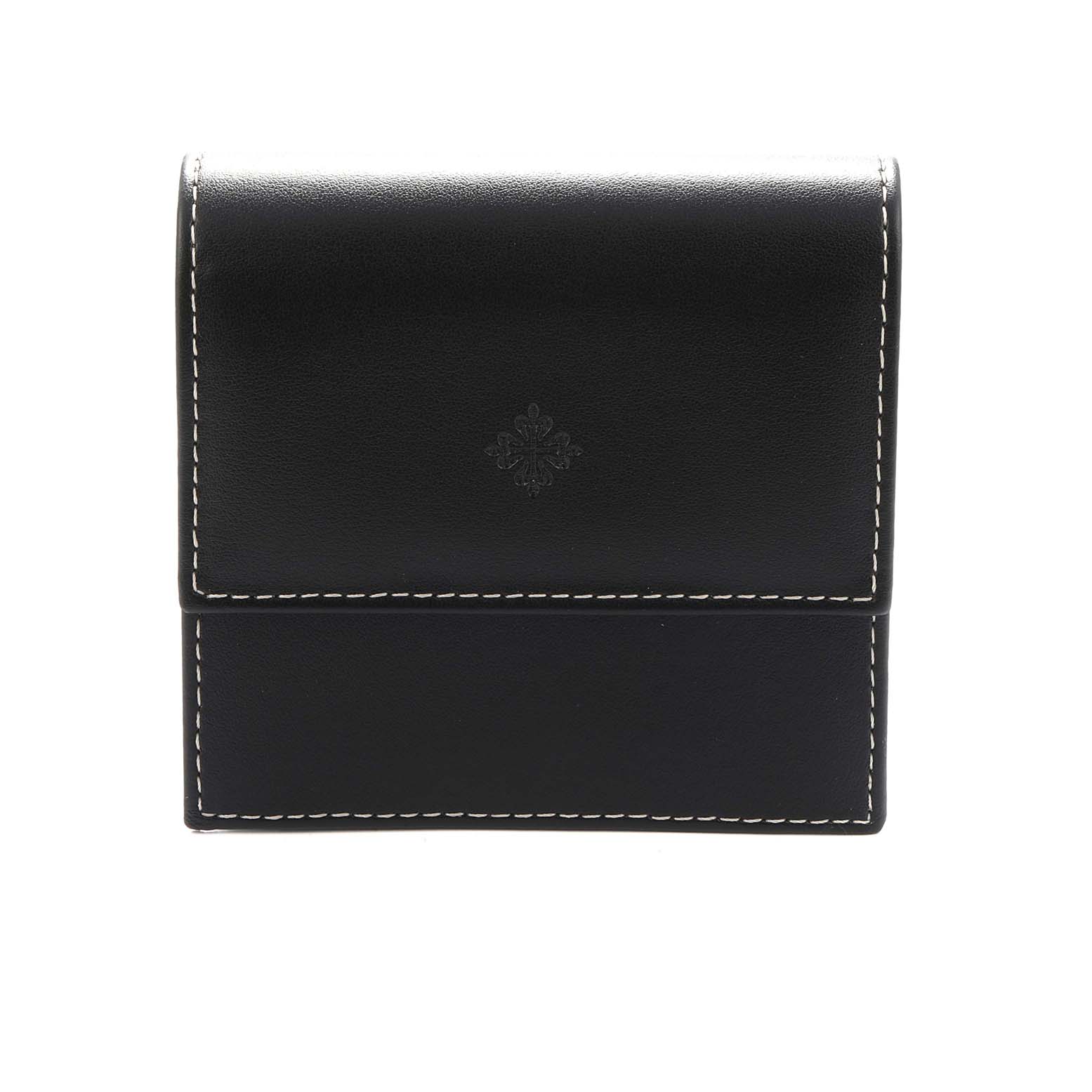 The image shows a Patek Philippe Calatrava 5196R Men
s Rose Gold Silver Dial watch case viewed from the front, featuring a black leather exterior with white stitching.