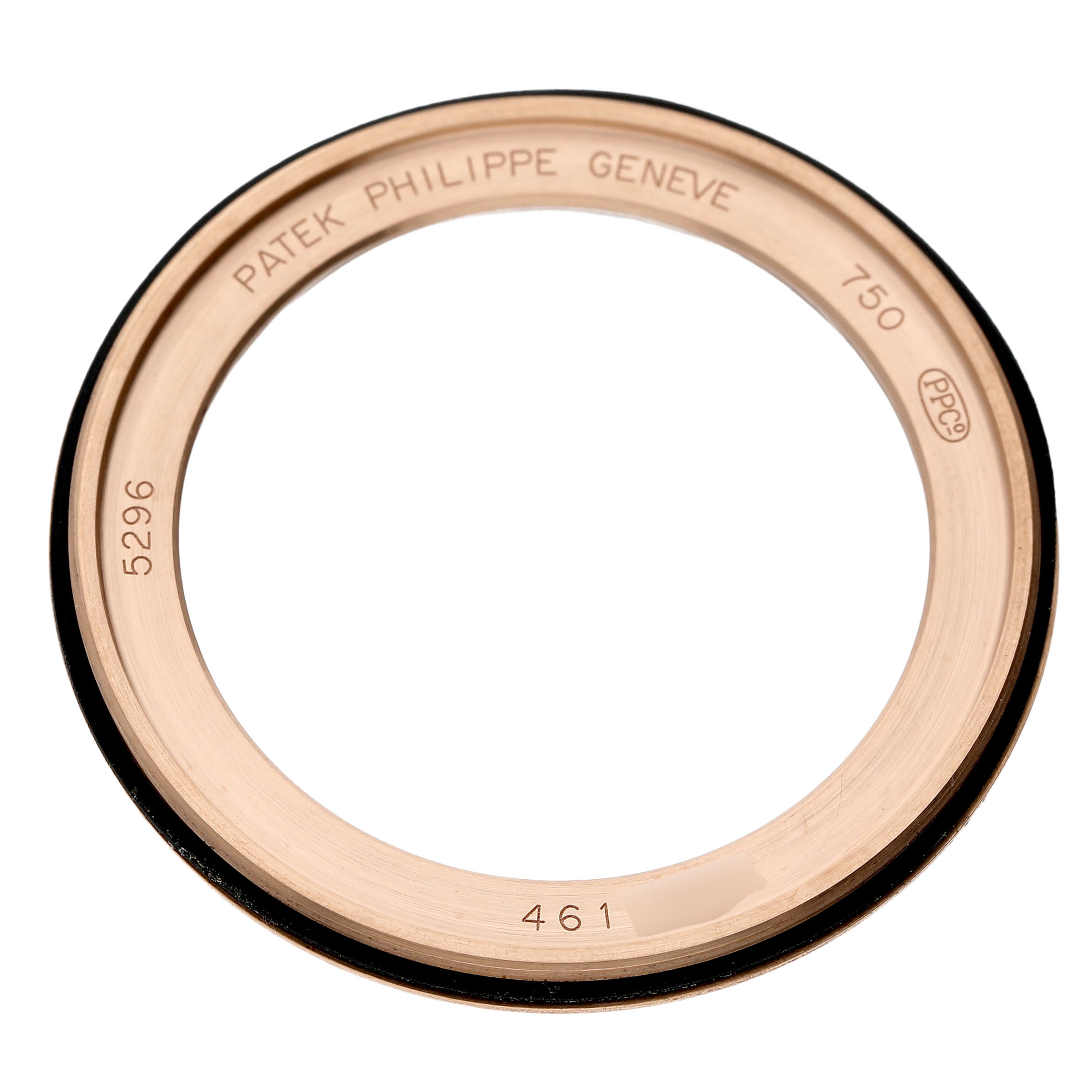 The image shows a detailed view of the bezel of a Patek Philippe Calatrava 5296R-010 Men's Rose Gold Silver Dial watch, showcasing engravings and markings.