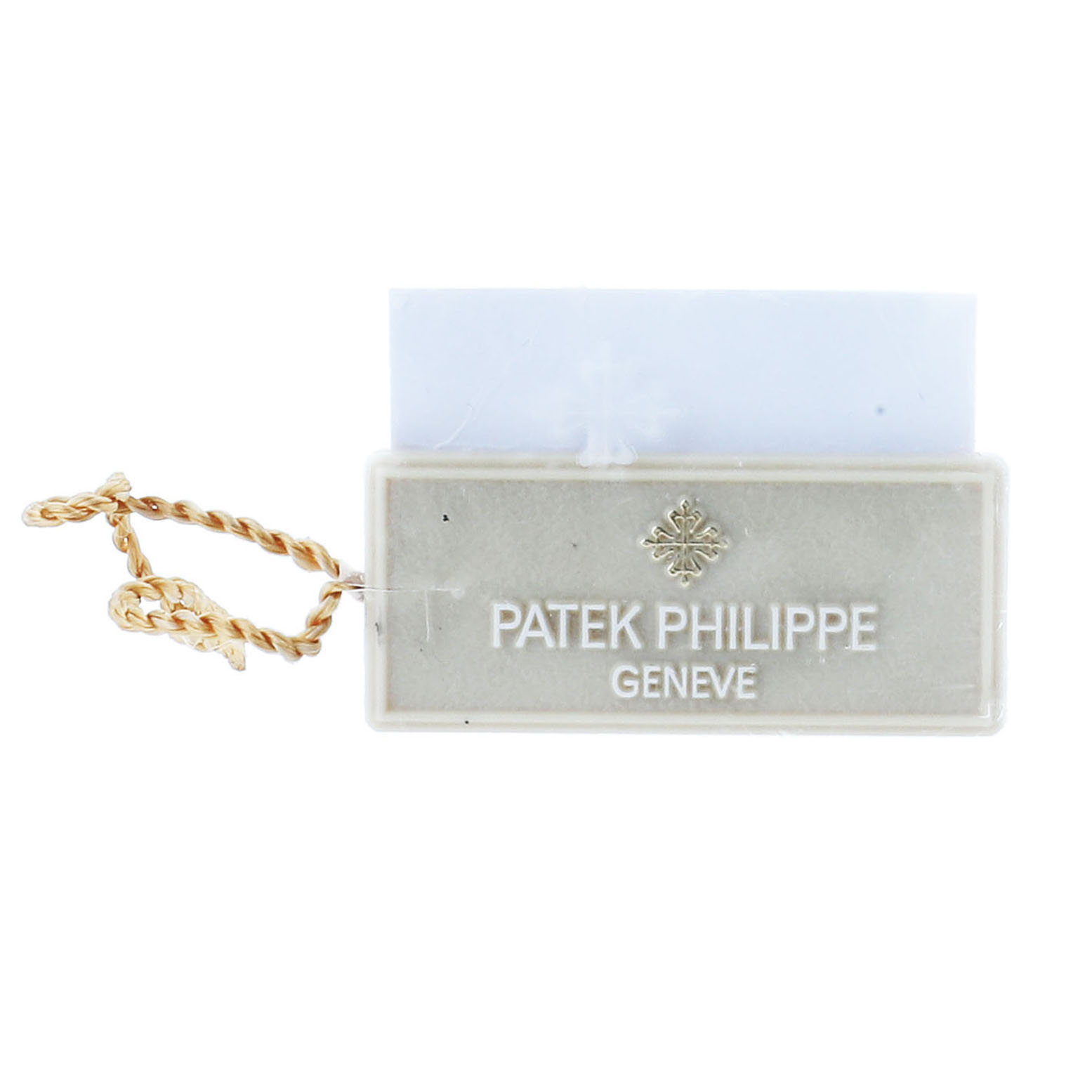 The image shows a Patek Philippe Calatrava 5296R-010 Men's Rose Gold Silver Dial tag with a gold twisted string attached, viewed from the front.