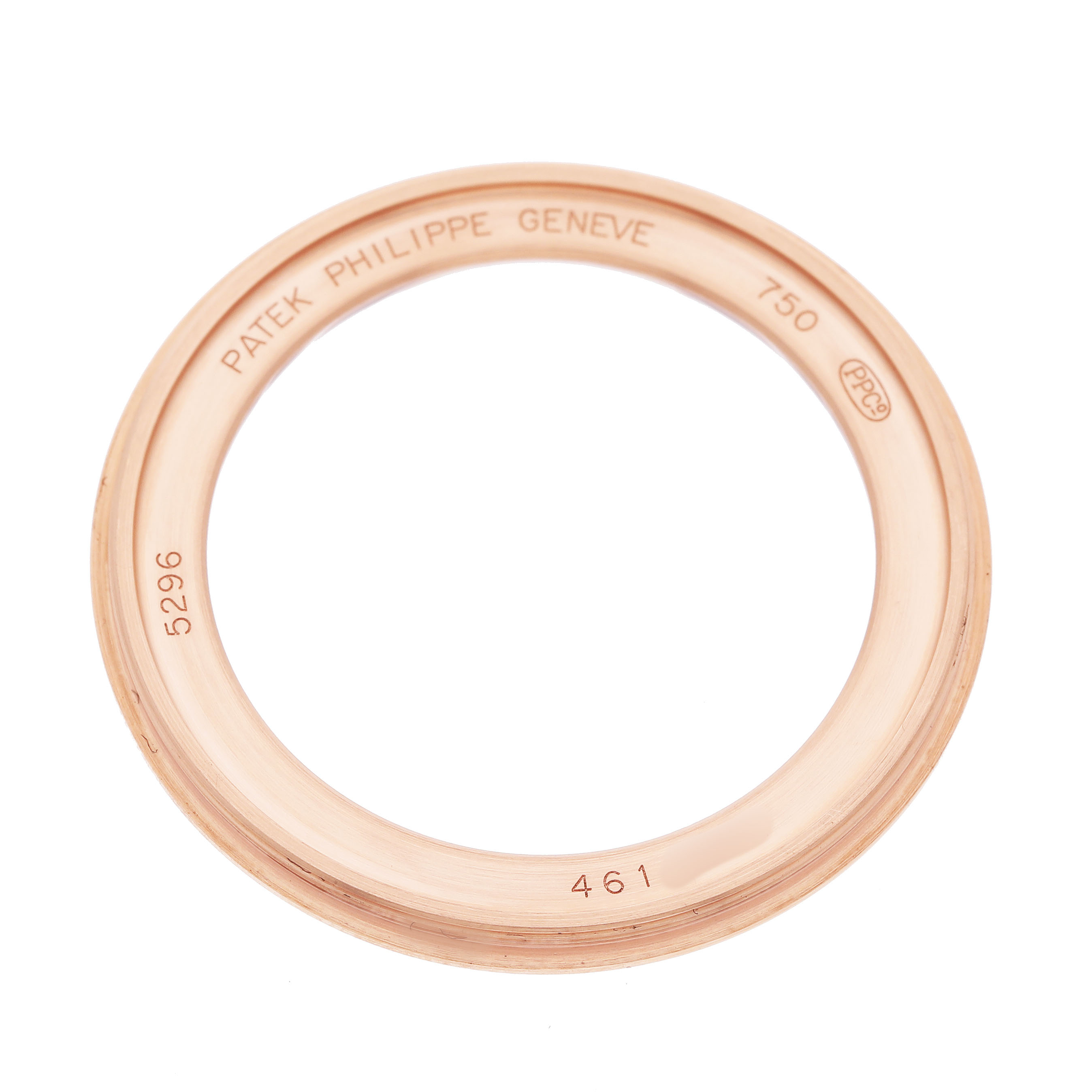The image shows a rose gold bezel for the Patek Philippe Calatrava 5296R-010 Men's Rose Gold Silver Dial model, viewed from above, displaying engravings.
