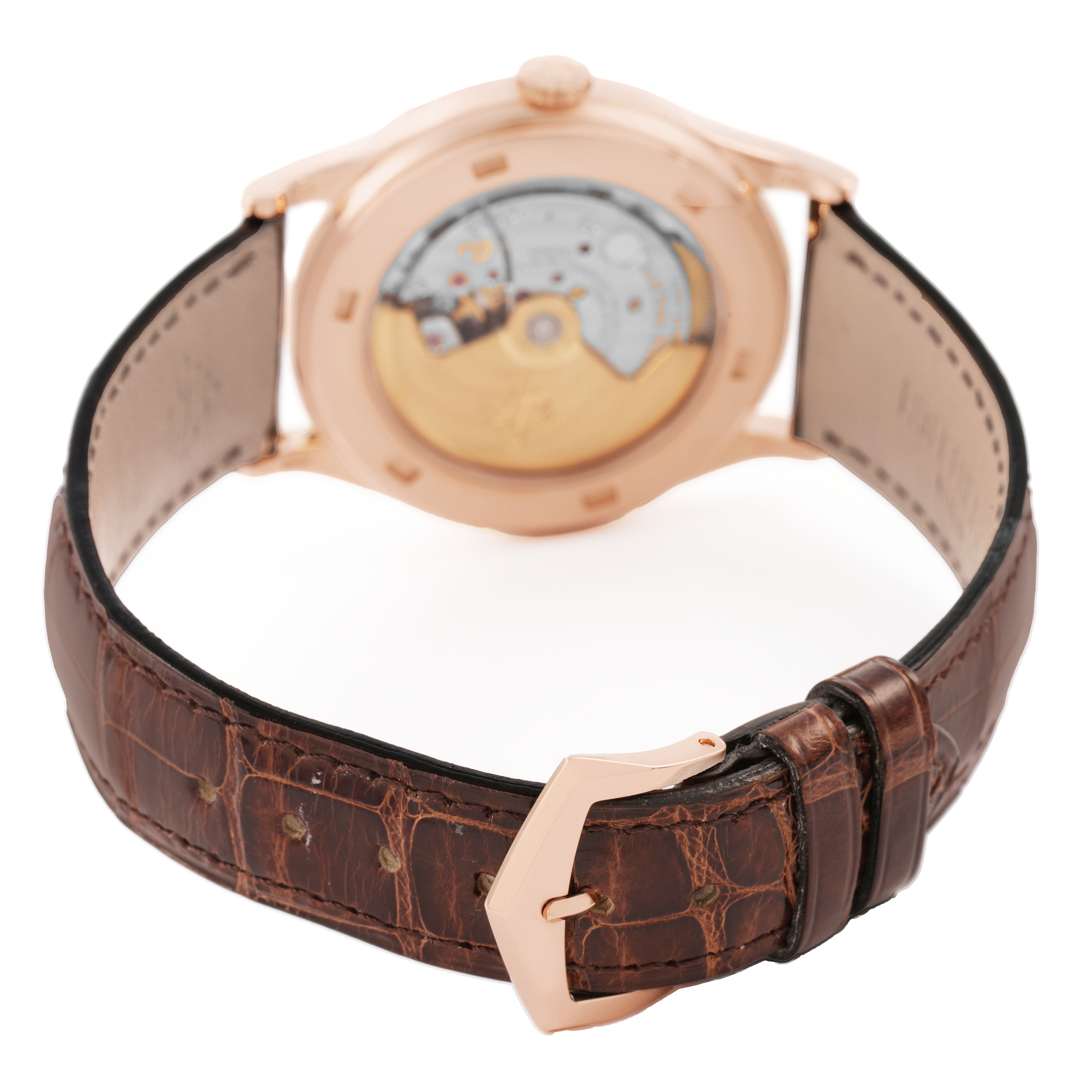 The image shows the rear view of a Patek Philippe Calatrava 5296R-010 Men's Rose Gold Silver Dial watch with its open case back and leather strap.