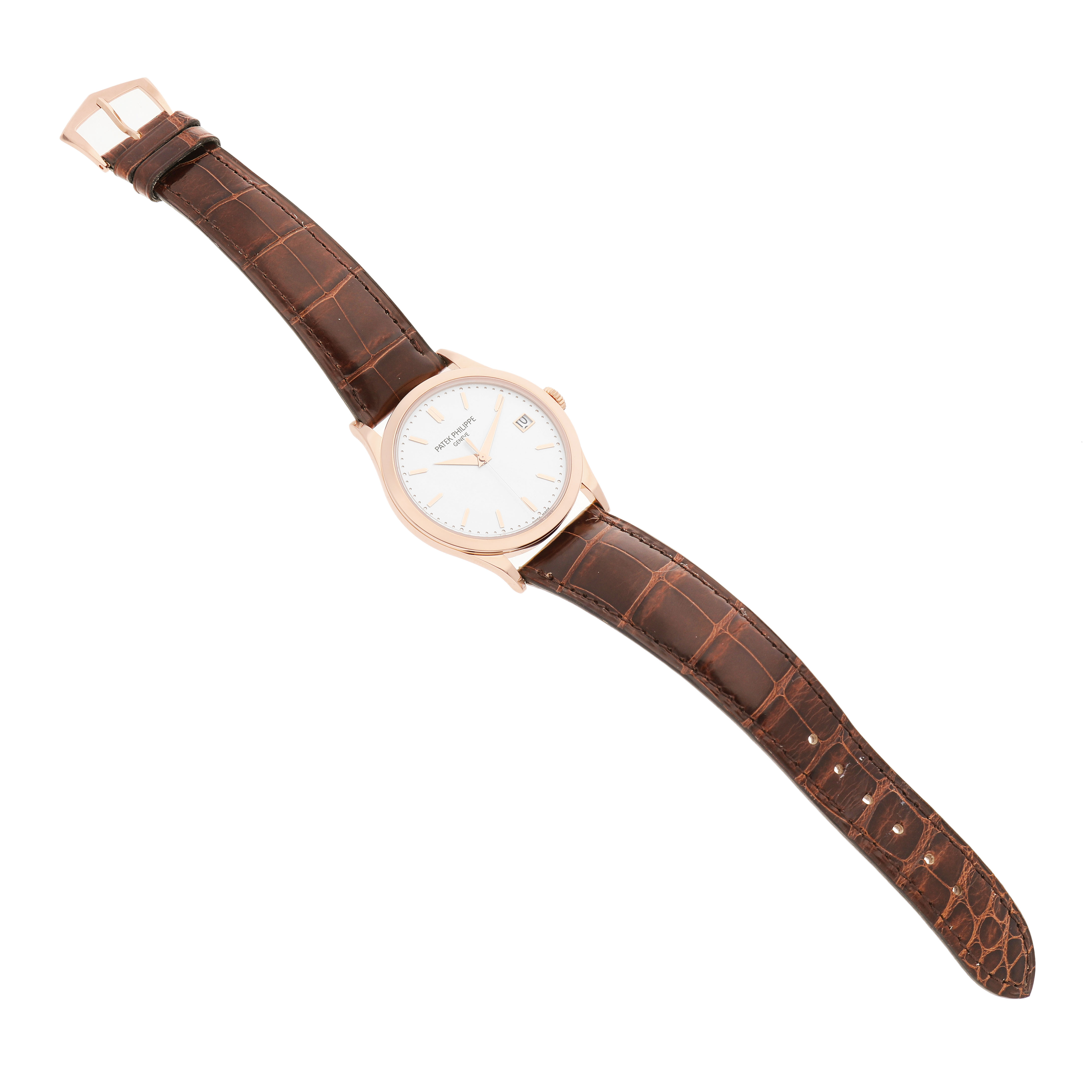 The Patek Philippe Calatrava 5296R-010 Men's Rose Gold Silver Dial watch is shown at a top-down angle, displaying the face, case, and full leather strap.