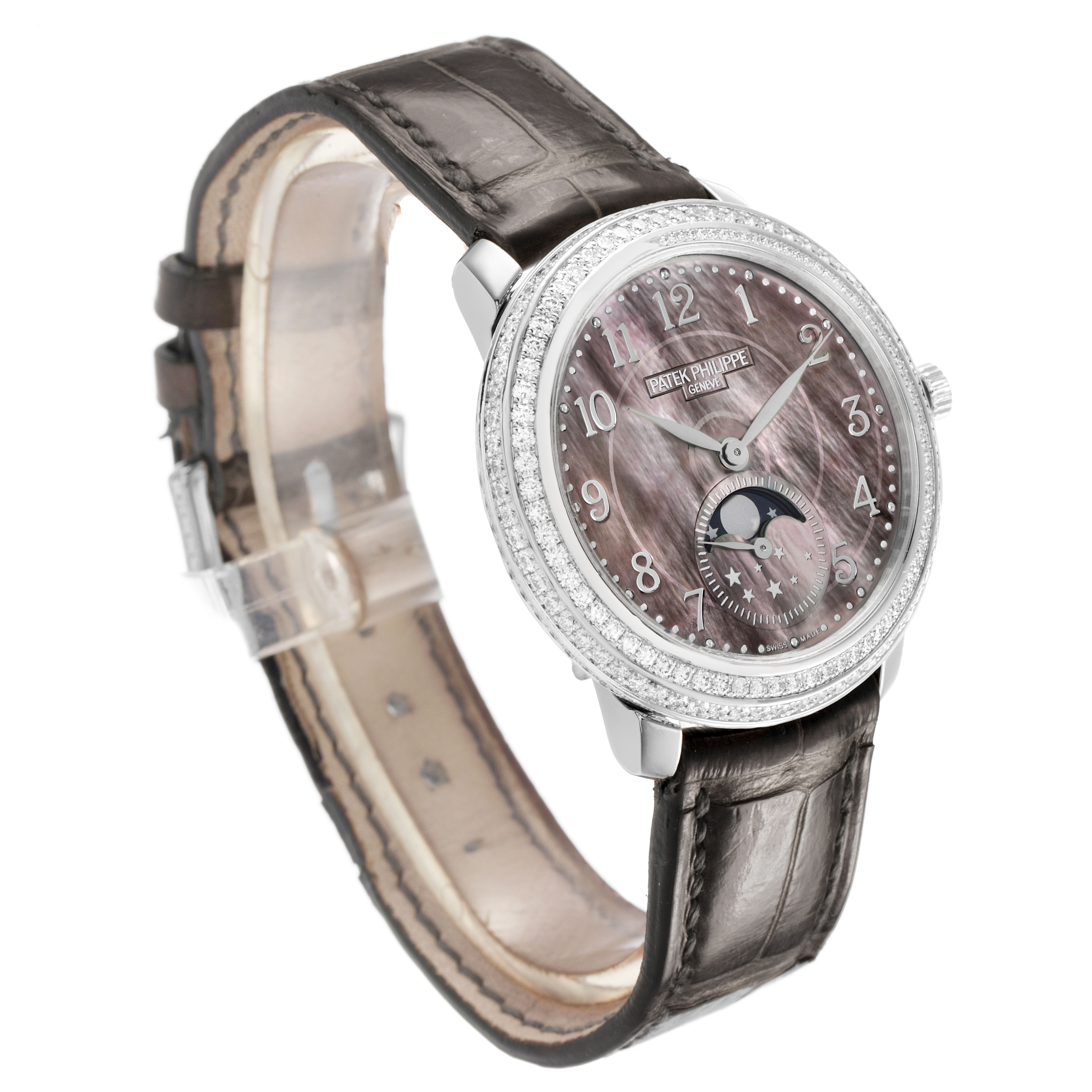 The Patek Philippe Complications 4968G-001 Women's White Gold Mother of Pearl Dial watch is shown at a three-quarter angle, highlighting its face, bezel, and strap.