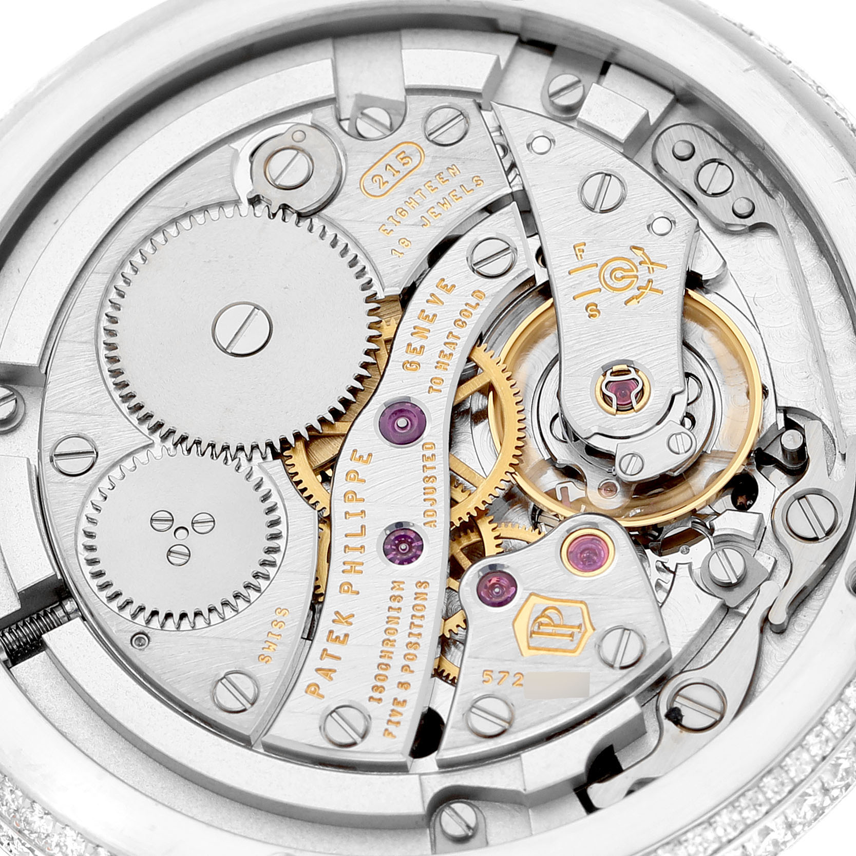 The image shows the back view of a Patek Philippe Complications 4968G-001 Women's White Gold Mother of Pearl Dial model, highlighting its intricate movement and components.