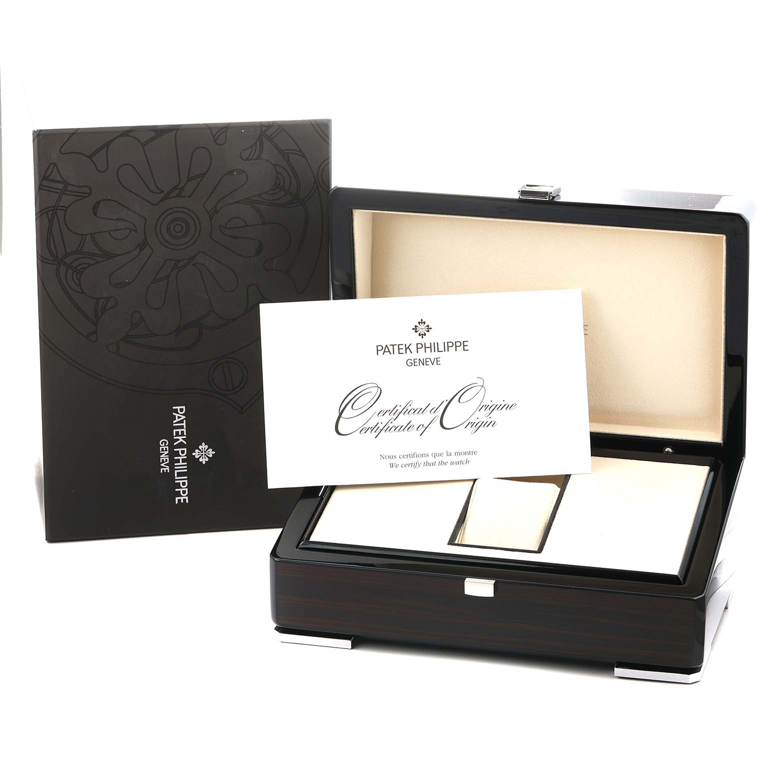 The image shows a Patek Philippe Nautilus 7008A Women
s Stainless Steel Silver Dial watch box open, revealing a certificate and compartments at a slightly angled front view.