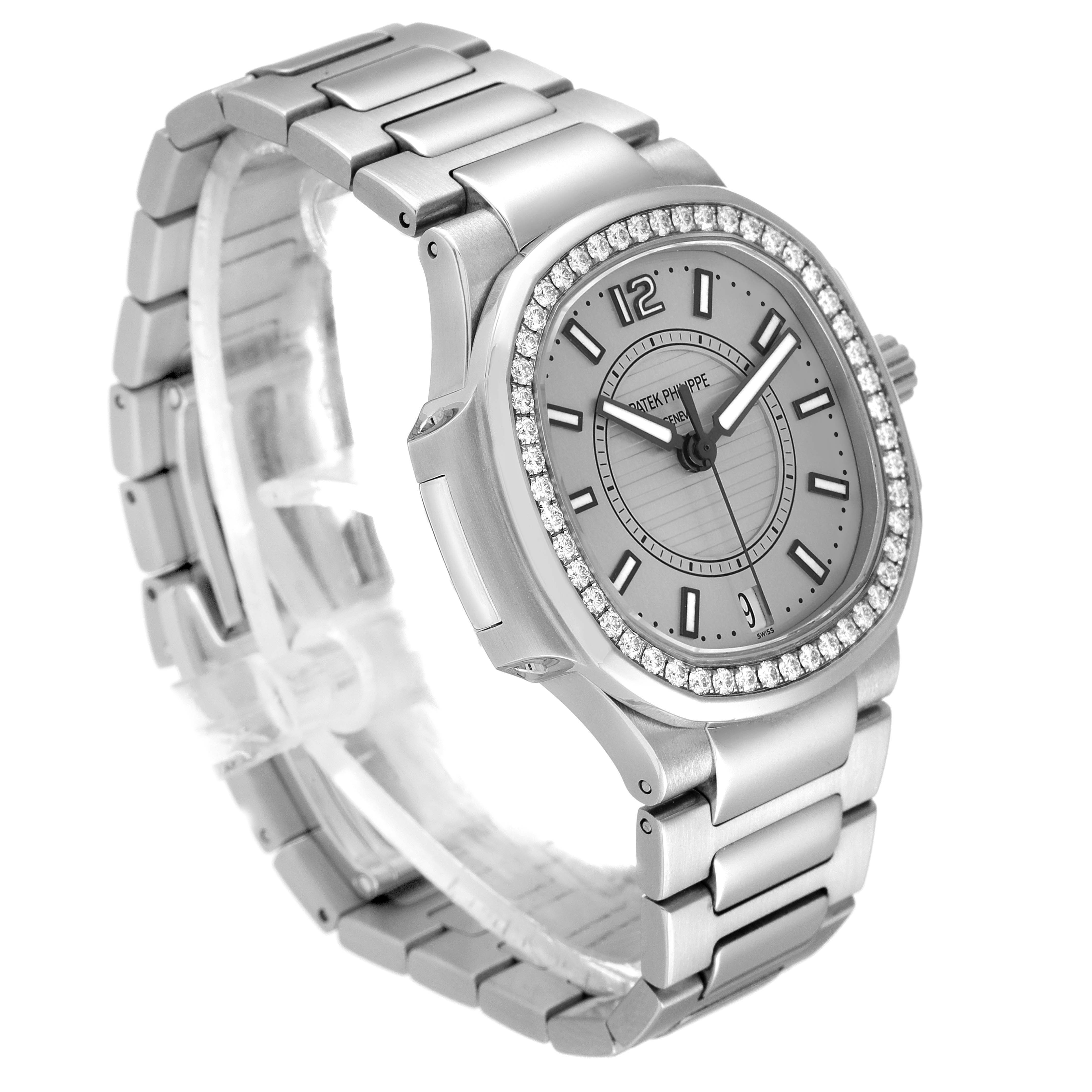 The Patek Philippe Nautilus 7008A Women
s Stainless Steel Silver Dial watch is shown at an angle showcasing its dial, diamond bezel, and bracelet.