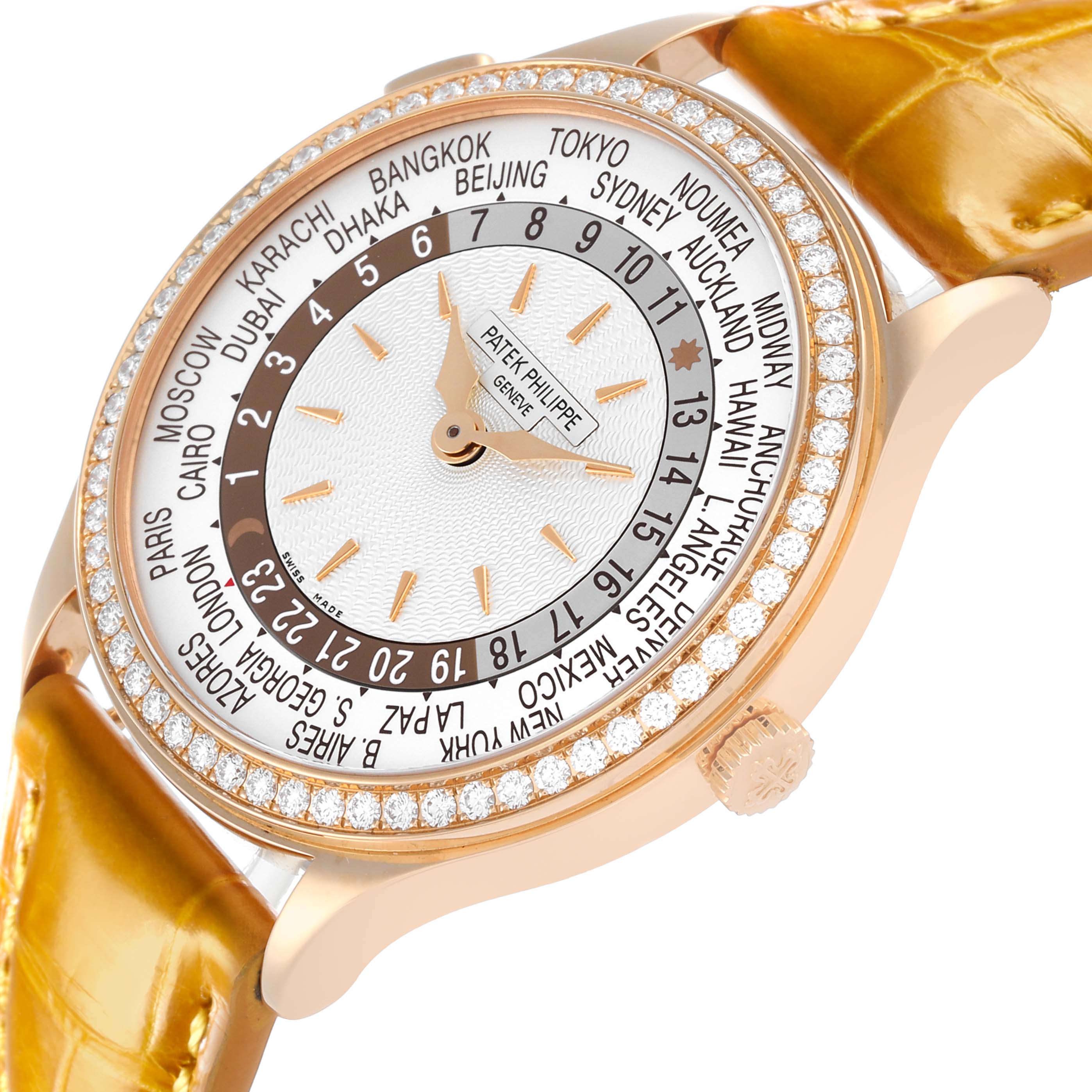The Patek Philippe Complications 7130R-013 Men's Rose Gold Silver Dial is shown at a slight angle, highlighting the world time dial, bezel, and part of the strap.