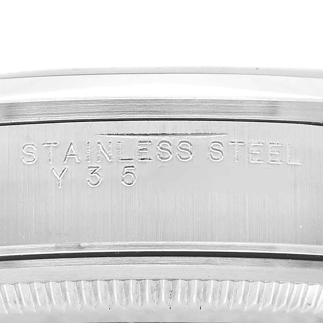 The image shows a close-up of the stainless steel case side of a Rolex Air-King 14000M Men's Stainless Steel White Dial watch.