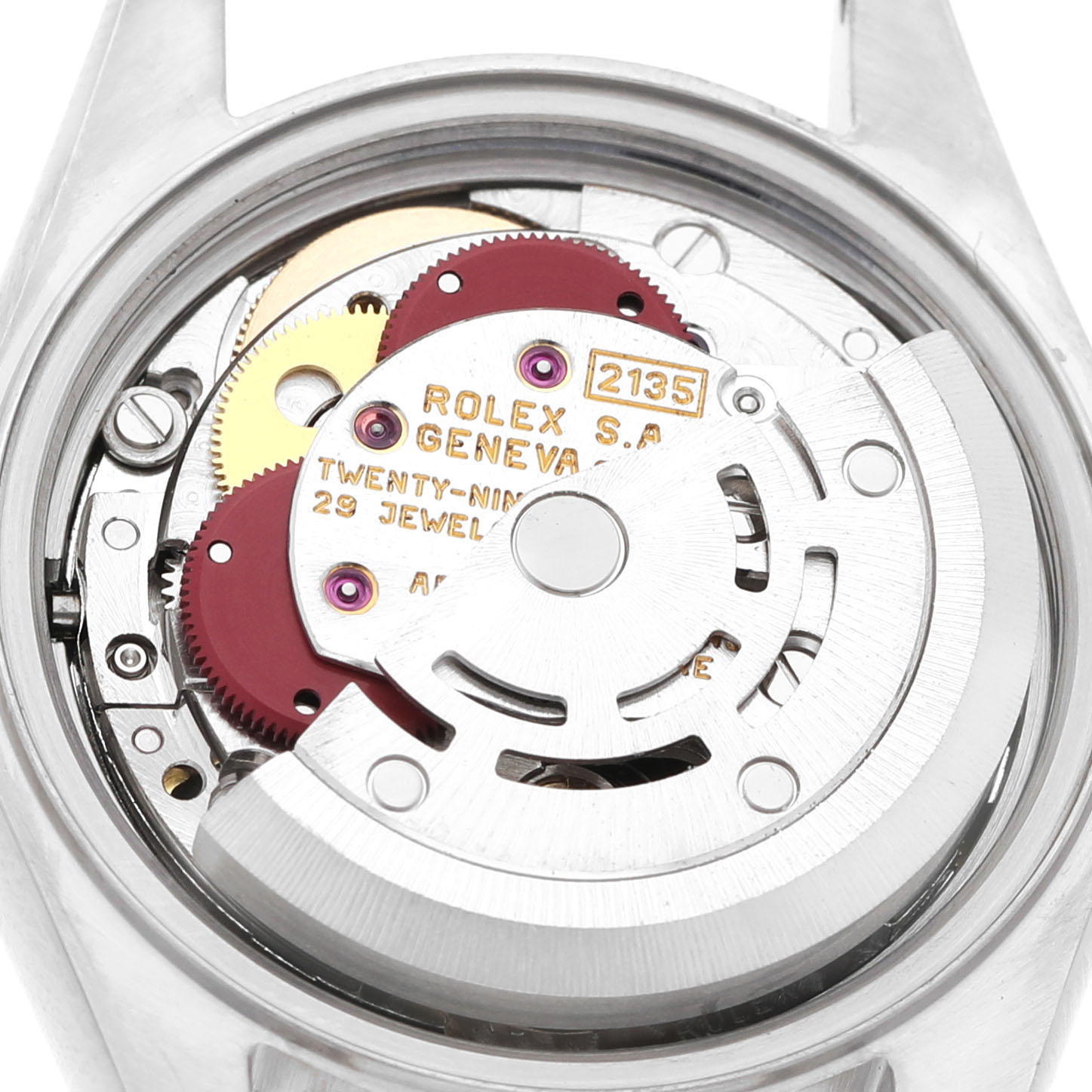 The image shows the movement of a Rolex Datejust 69173 Women's Steel and Gold (two tone) Champagne Dial watch from a top view, highlighting its gears and rotor.