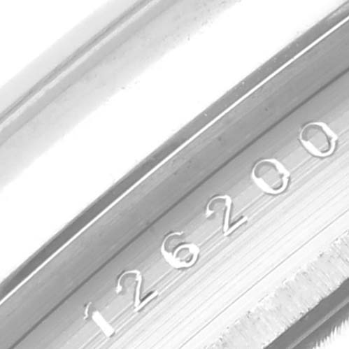 The image shows a close-up of the bezel and case edge of a Rolex Datejust 126200 Men's Stainless Steel Green Dial 126200 Men's Stainless Steel Green Dial, displaying the model number 126200.