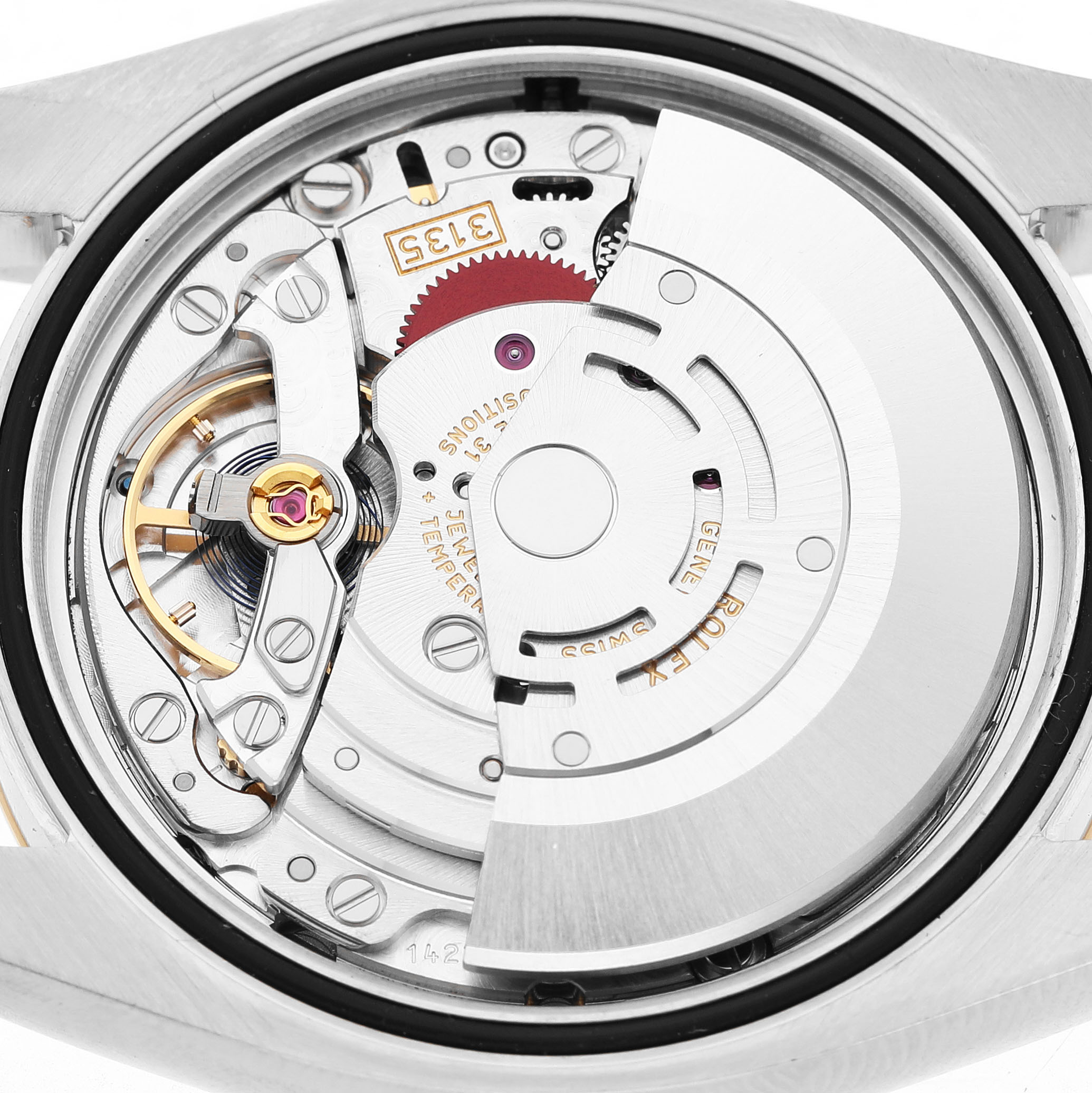 The image shows the movement of a Rolex Datejust 116233 Men's Steel and Gold (two tone) White Dial, highlighting its intricate inner mechanics from a back view.