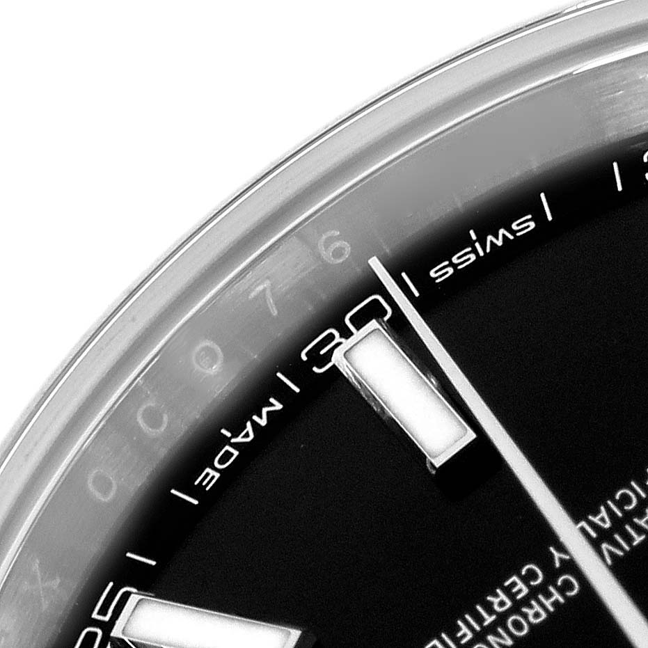 The image shows a close-up of the dial edge of the Rolex Datejust 41 126300 Men's Stainless Steel Black Dial 126300 Men's Stainless Steel Black Dial, highlighting the indices and text details.