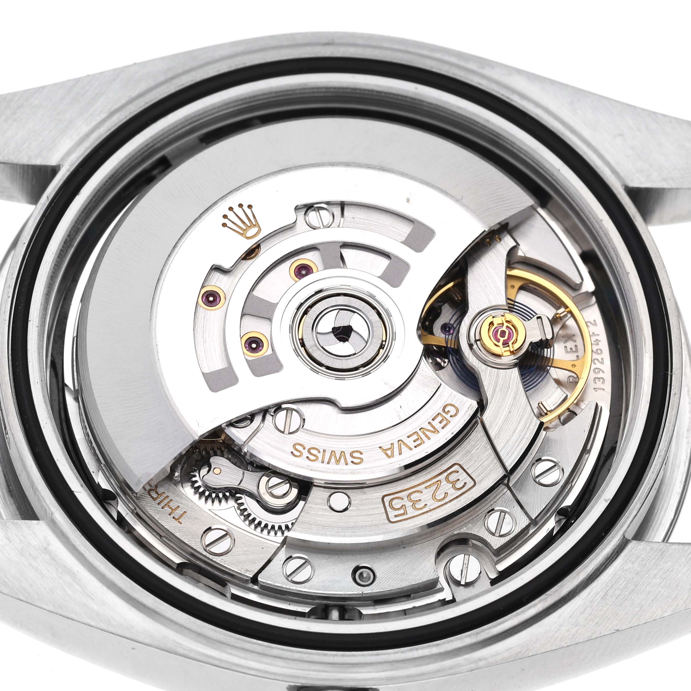 The image shows the movement of the Rolex Datejust 41 126300 Men's Stainless Steel Black Dial 126300 Men's Stainless Steel Black Dial from a top-down angle, highlighting its intricate mechanics.