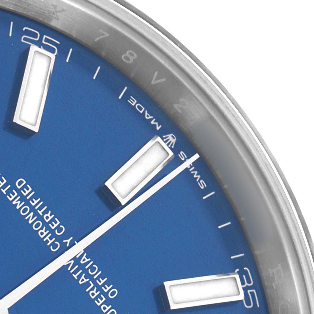 The image shows a close-up of the Rolex Datejust 41 126334 Men
s Stainless Steel Blue Dial dial, highlighting the blue face, markers, and part of the bezel.