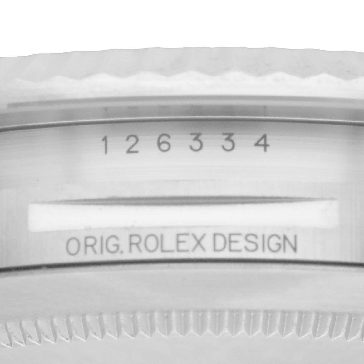 This image shows the side view of a Rolex Datejust 41 126334 Men
s Stainless Steel Blue Dial, focusing on the case design and reference number.