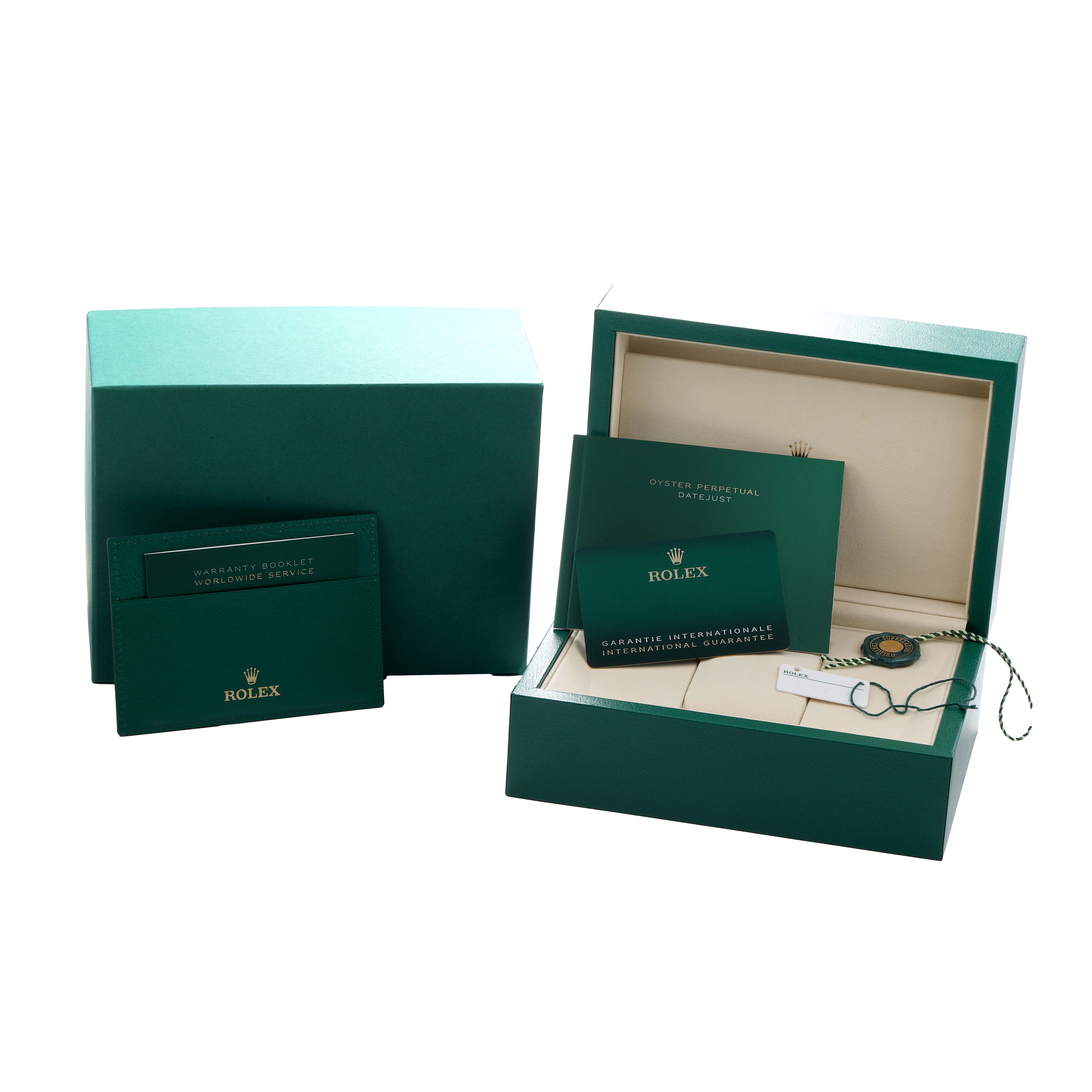 The image shows the Rolex Datejust 41 126334 Men
s Stainless Steel Blue Dial box, warranty booklet, and accessories at a frontal angle.