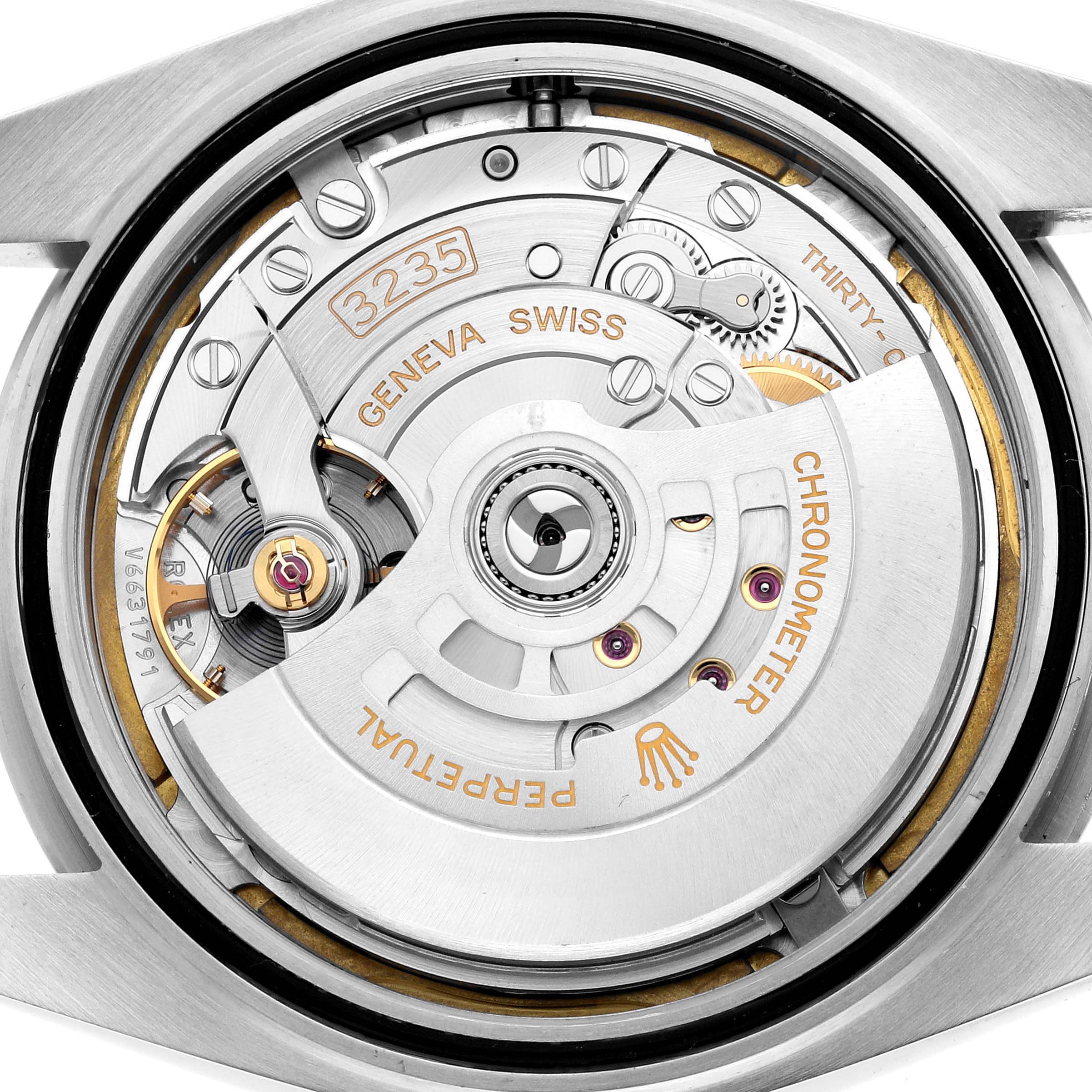 The image shows the back view of a Rolex Datejust 41 126300 Men
s Stainless Steel White Dial, detailing its movement and internal components.