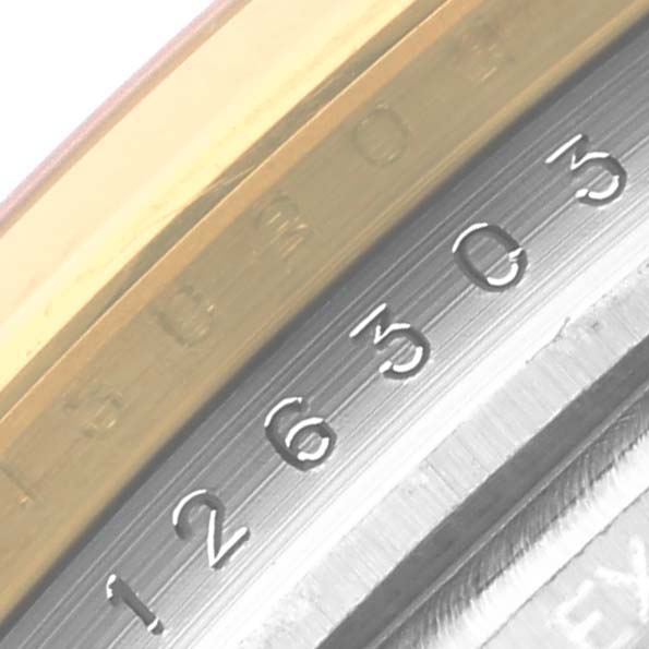 The image shows a close-up of the rim engraving on the bezel of a Rolex Datejust 41 126303 Men's Steel and Gold (two tone) White Dial 126303 Men's Steel and Gold (two tone) White Dial watch.
