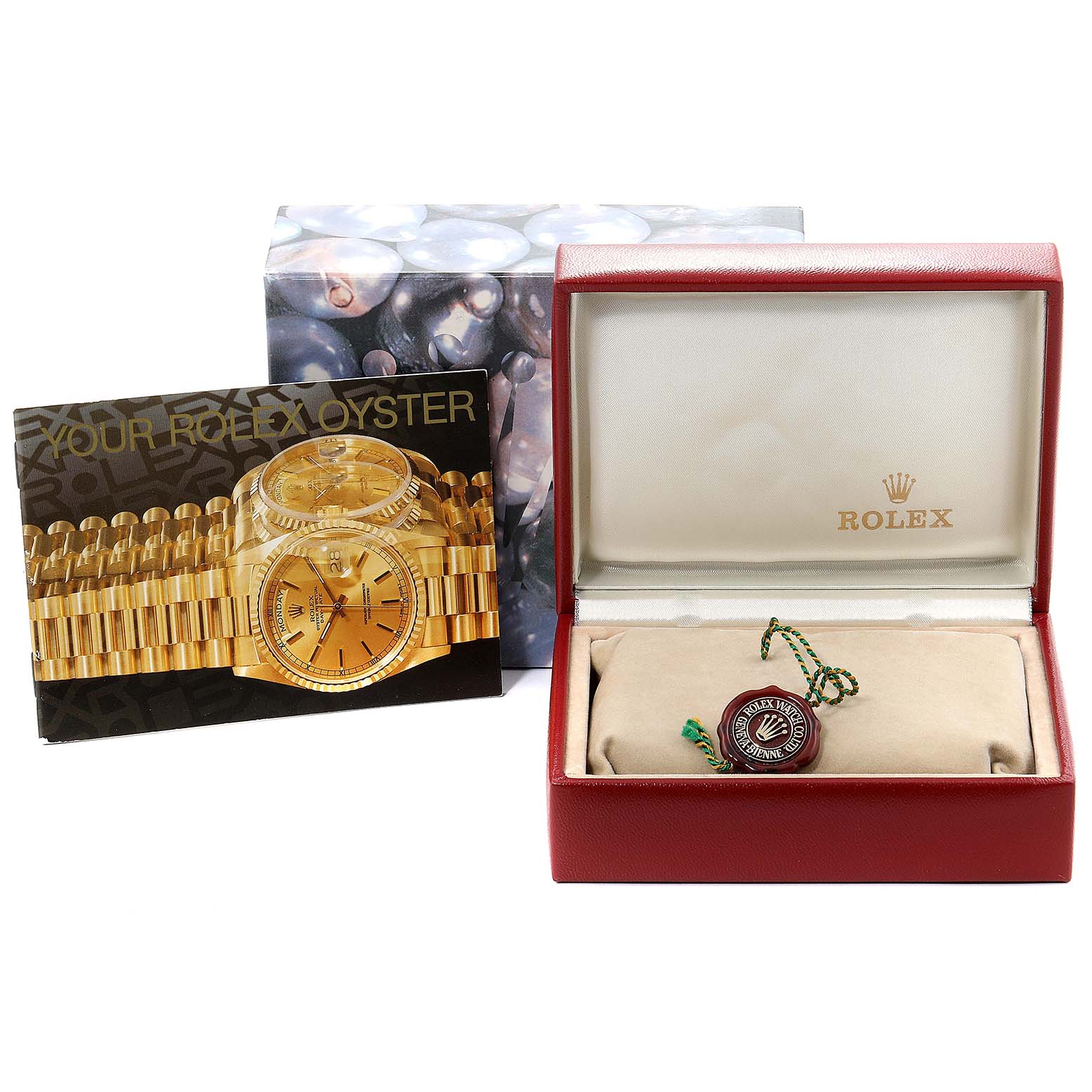The image shows a Rolex Datejust 79173 Women's Yellow Gold Mother of Pearl Dial 79173 Women's Yellow Gold Mother of Pearl Dial watch box, a Rolex tag, and a booklet displaying the watch model.