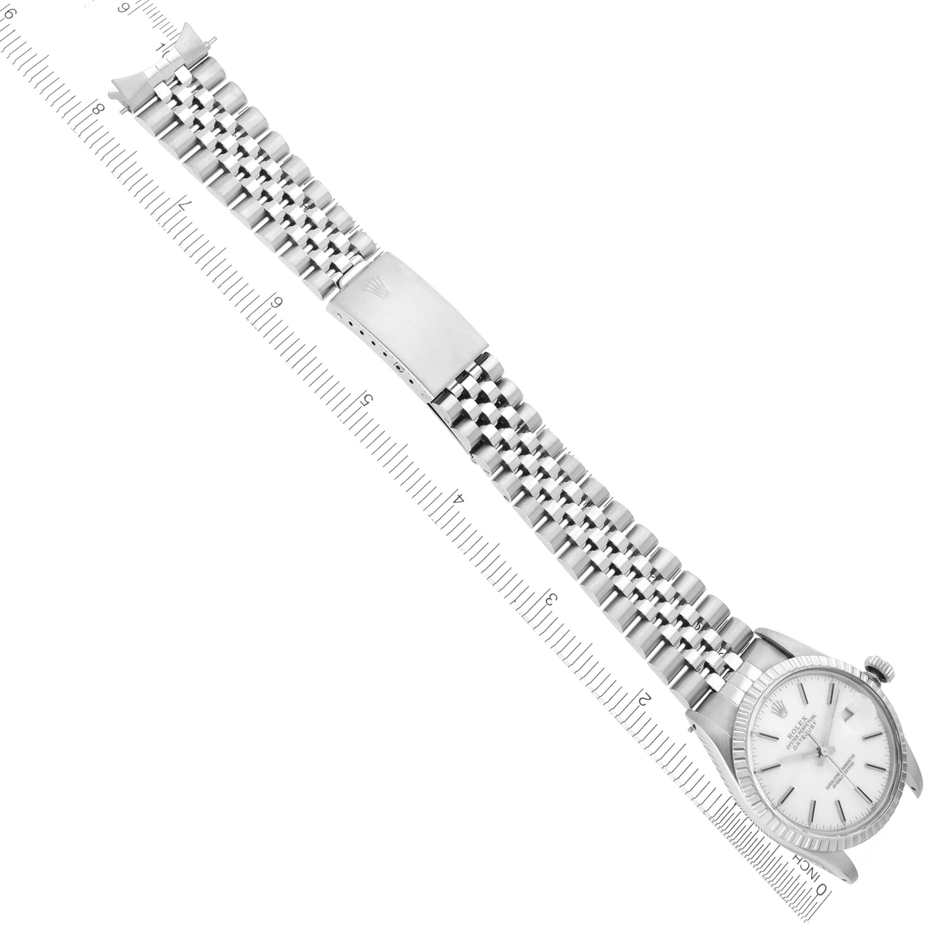 The image shows a Rolex Vintage Collection 16030 Men's Stainless Steel White Dial 16030 Men's Stainless Steel White Dial watch laid flat with its bracelet fully extended alongside a ruler.