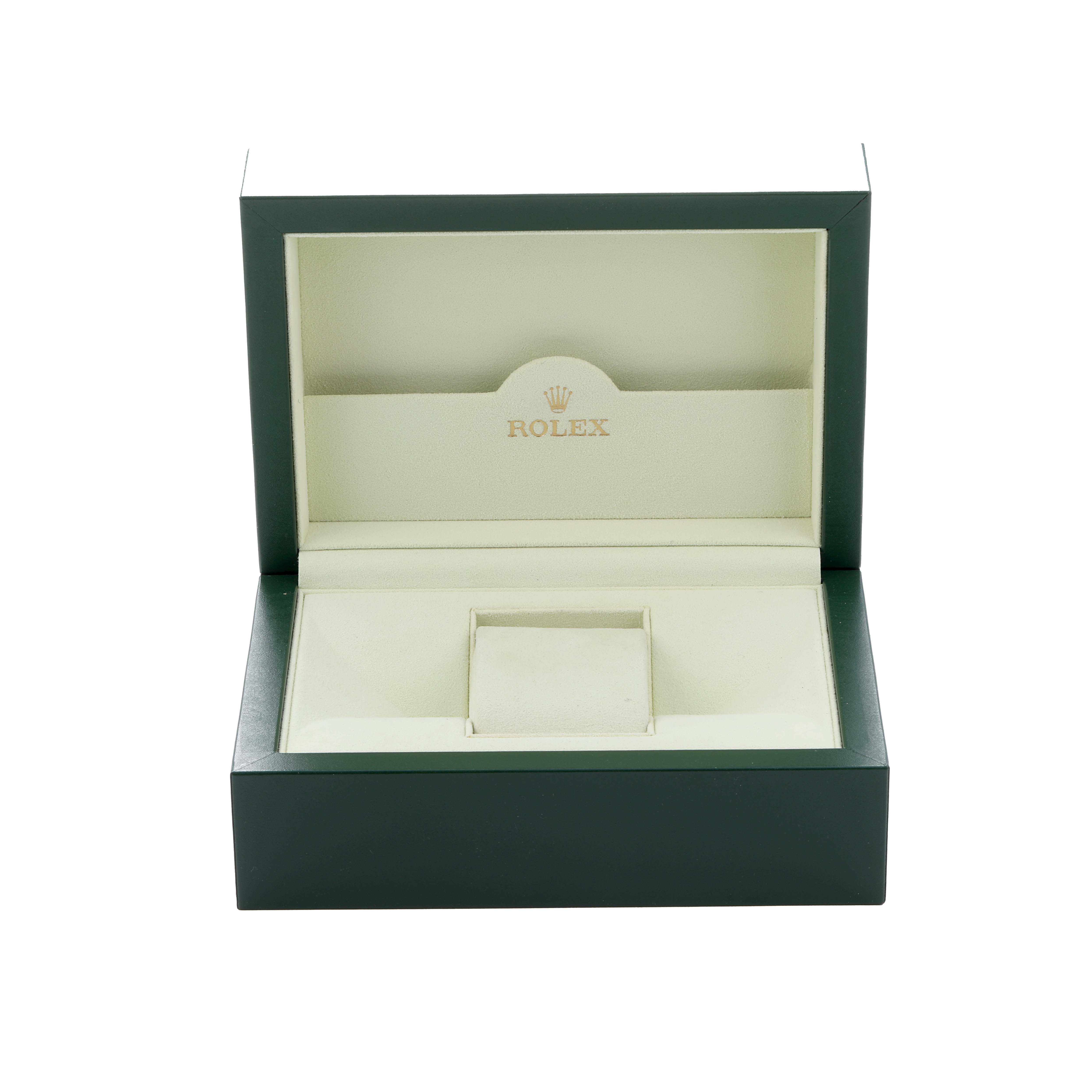 The image shows an open Rolex Datejust 41 116333 Men
s Steel and Gold (two tone) Silver Dial box, displaying its interior with a cushion for the watch.