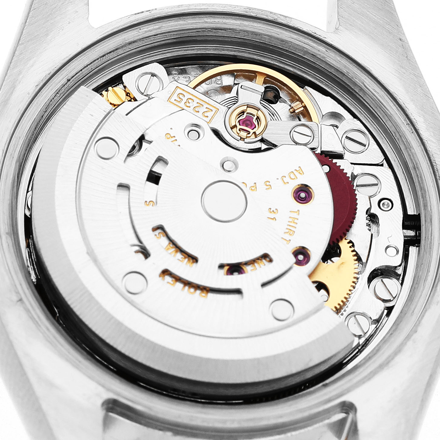 The image shows the movement of a Rolex Datejust 179163 Women's Steel and Gold (two tone) Blue Dial watch from the back, highlighting its intricate mechanical components.