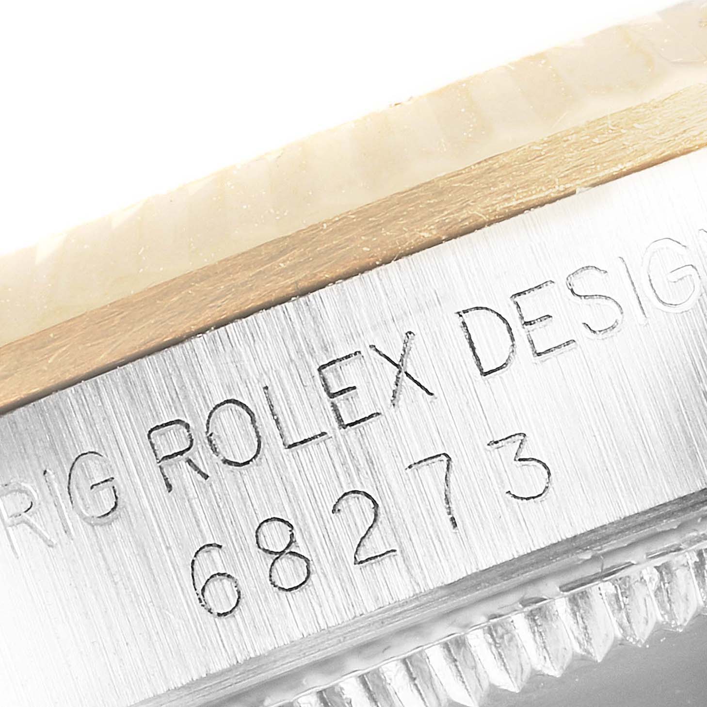 Close-up view of the case side showing the engraved model number 
68273
 on a mid-size Rolex watch.