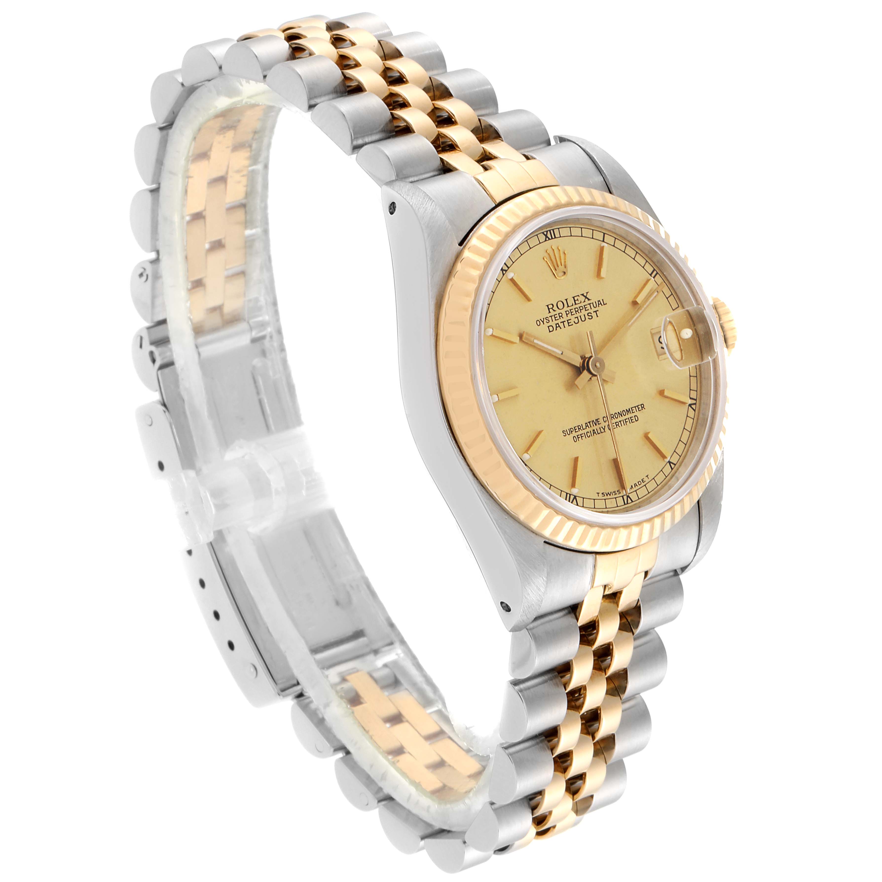 The image shows a Rolex Mid-Size 68273 Women
s Steel and Gold (two tone) Champagne Dial 68273 Women
s Steel and Gold (two tone) Champagne Dial Datejust watch angled to display the face, bezel, and bracelet.
