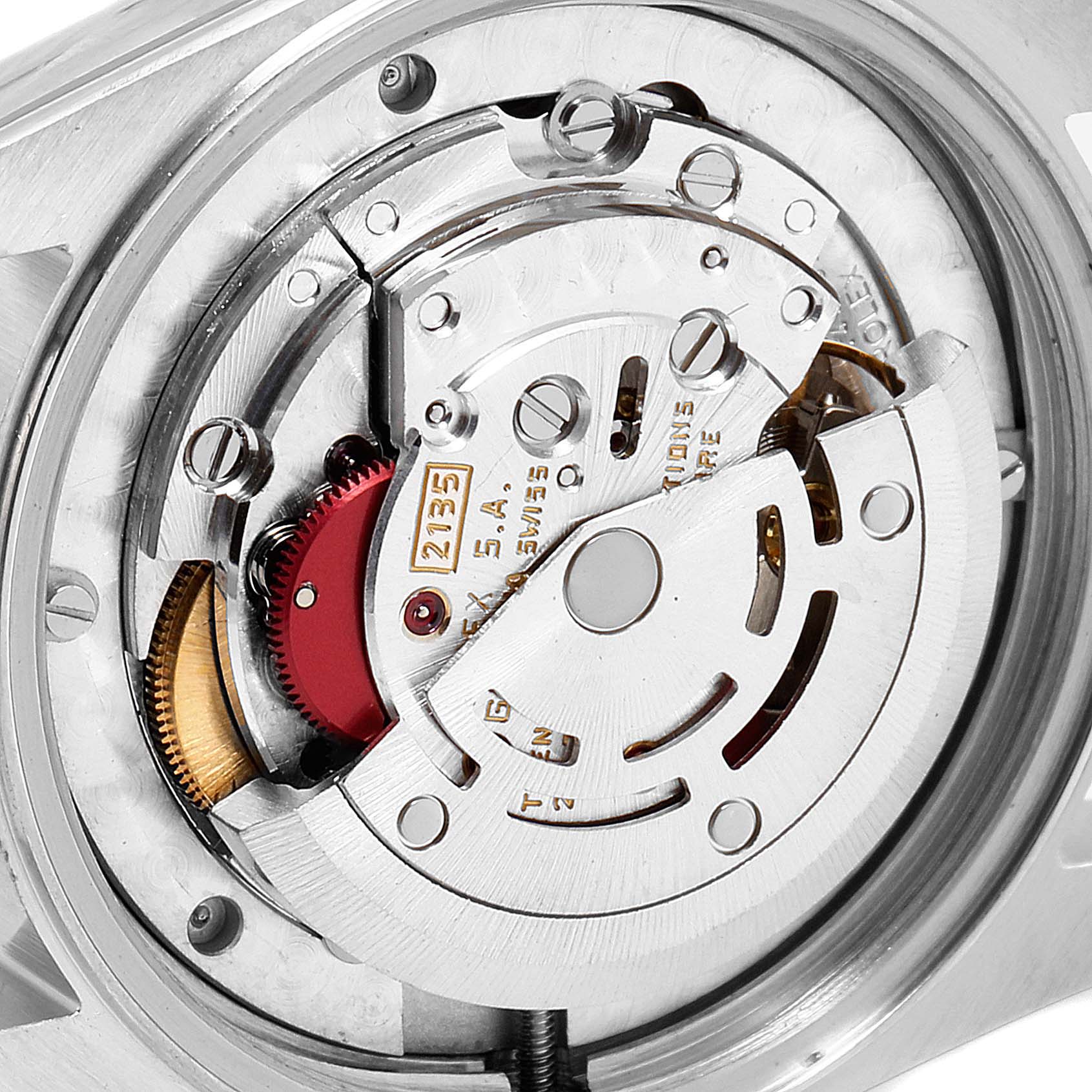This zoomed-in image shows the intricate inner workings and mechanism of a Rolex Mid-Size 68273 Women
s Steel and Gold (two tone) Champagne Dial 68273 Women
s Steel and Gold (two tone) Champagne Dial model watch.
