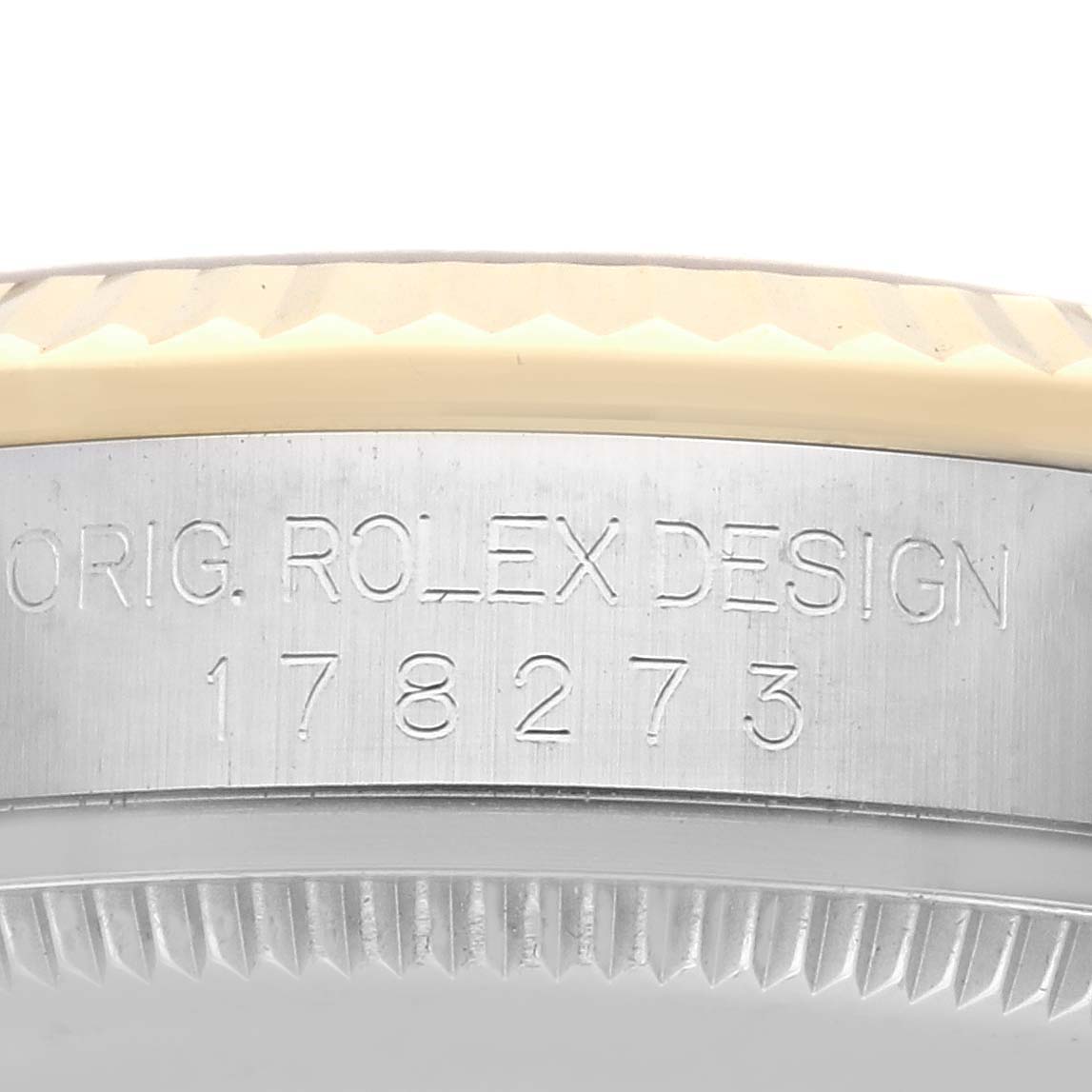 The image shows a close-up of the case side of a Rolex Mid-Size 178273 Women's Steel and Gold (two tone) Black Dial 178273 Women's Steel and Gold (two tone) Black Dial watch, displaying the "ORIG. ROLEX DESIGN" engraving and model number.