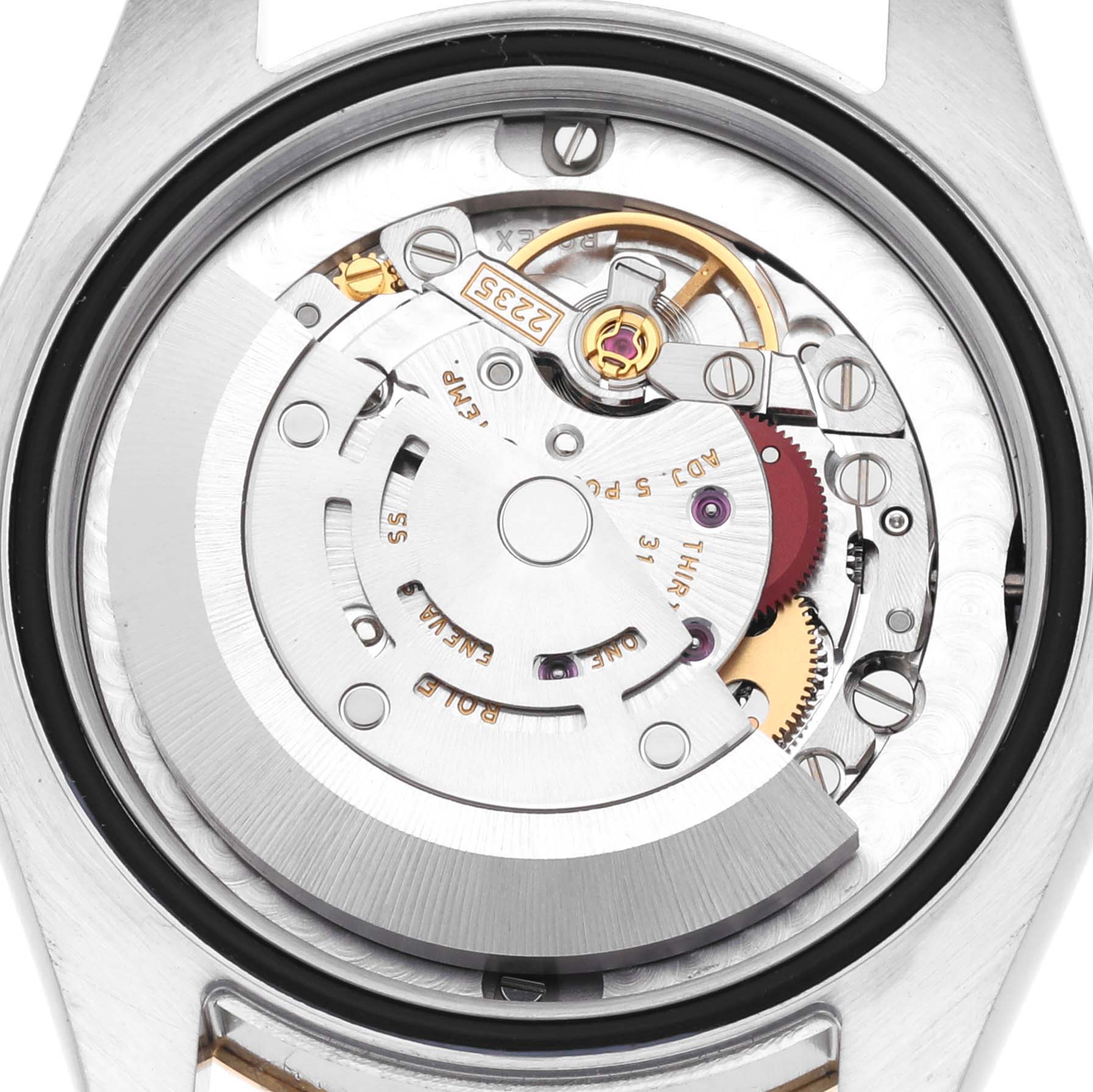 The image shows the internal mechanism of a Rolex Mid-Size 178273 Women's Steel and Gold (two tone) Black Dial 178273 Women's Steel and Gold (two tone) Black Dial model watch, viewed from the back.