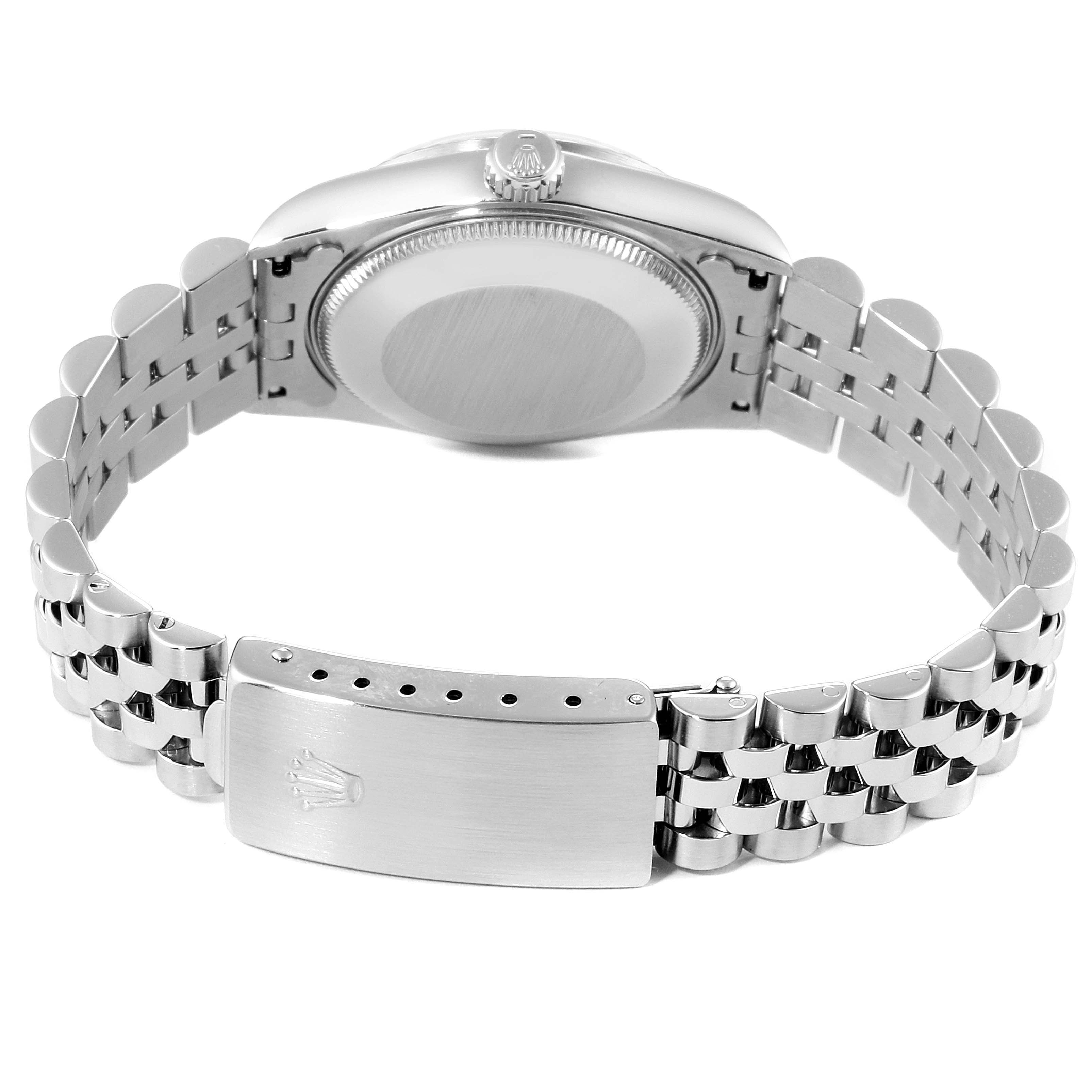 This image shows the back view of a Rolex Datejust 68274 Women's Stainless Steel Silver Dial 68274 Women's Stainless Steel Silver Dial watch, highlighting the caseback, crown, and bracelet with the clasp visible.