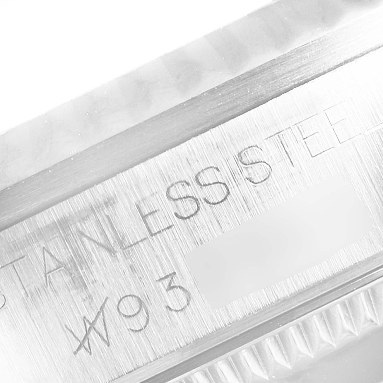 This image shows a close-up angle of the case side of a Rolex Datejust 68274 Women's Stainless Steel Silver Dial 68274 Women's Stainless Steel Silver Dial watch, highlighting the brushed stainless steel finish and engraved text.
