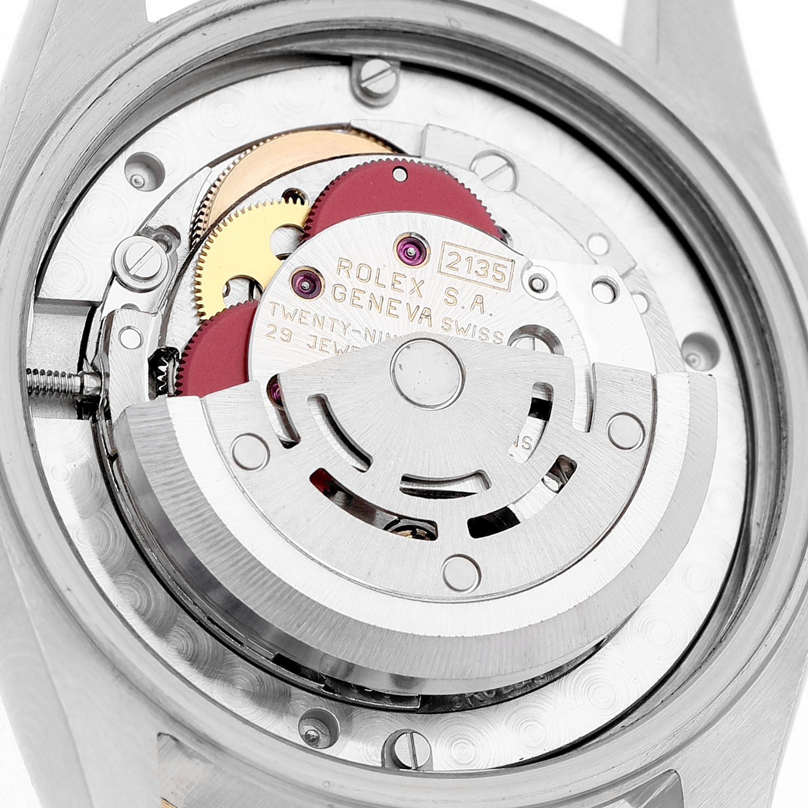 The image shows the movement of a Rolex Datejust 68243 Women's Steel and Gold (two tone) Blue Dial watch from a top-down angle, featuring gears and the rotor.
